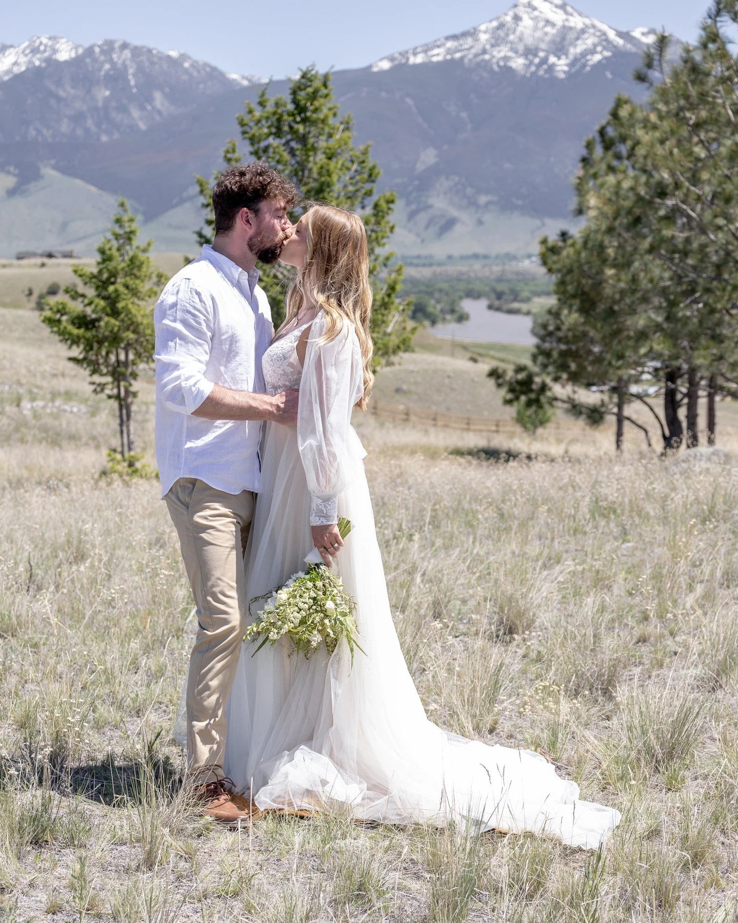 Sealed with a kiss, where love feels as endless as the mountain views and every moment becomes a forever memory. 💍⛰️

Photographer- @kylie.jones.photo
Venue- @peaceofparadisemt
Bridal dress- @plumebridal 

 #peaceofparadisemt #paradisevalleymontana 