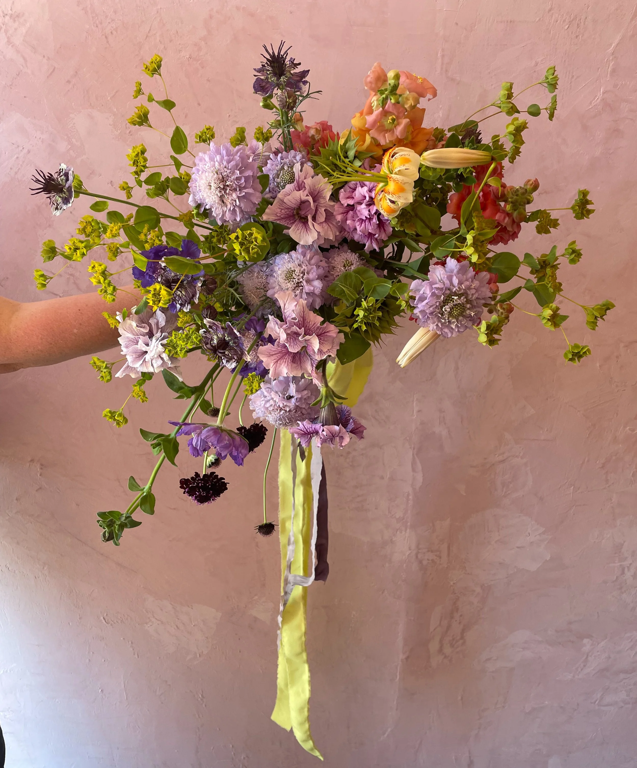 bridal bouquet in hallway.jpg