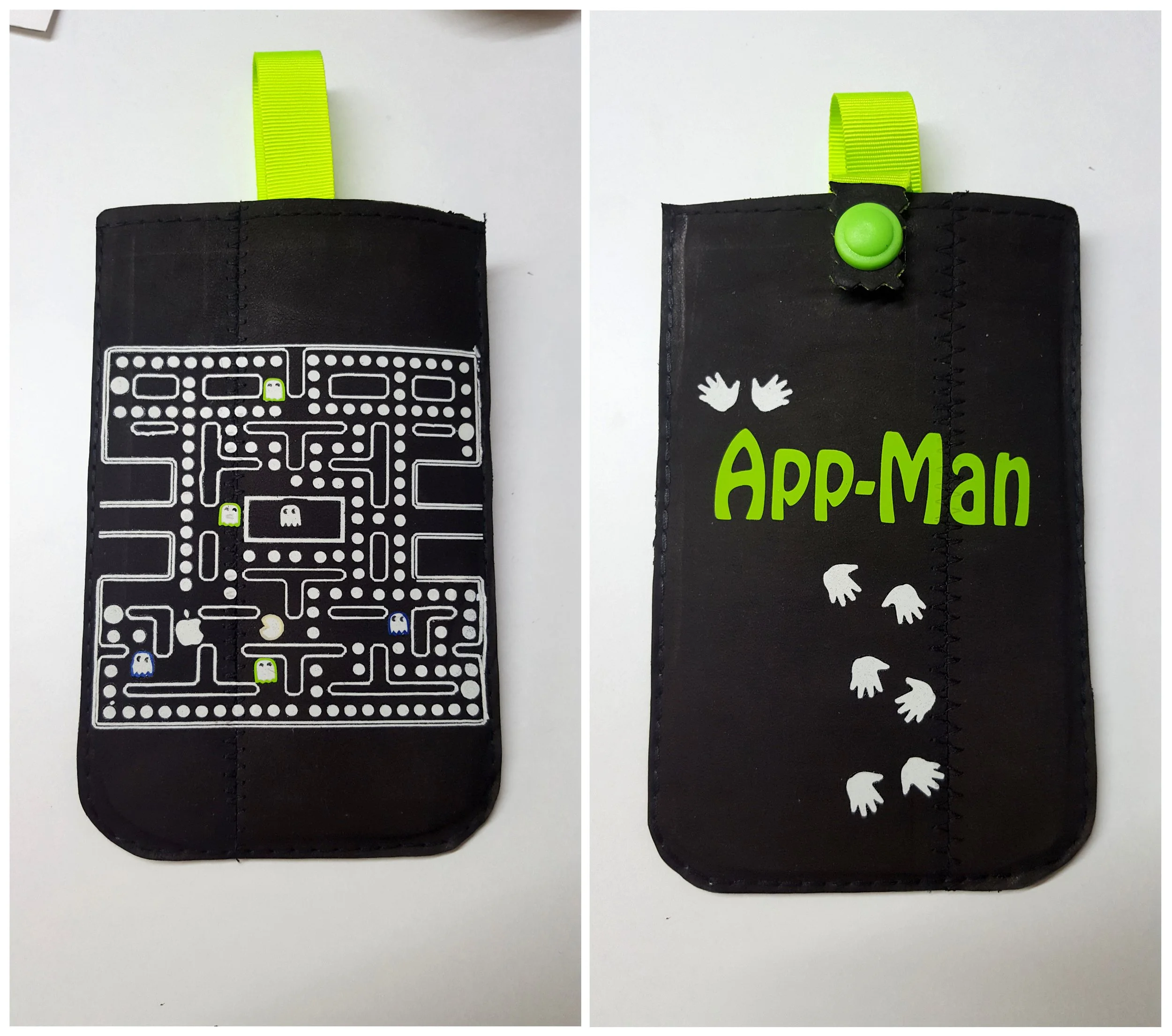 Handyhülle mit Schriftzug "App-Man" und Pacman-Spielfeld.