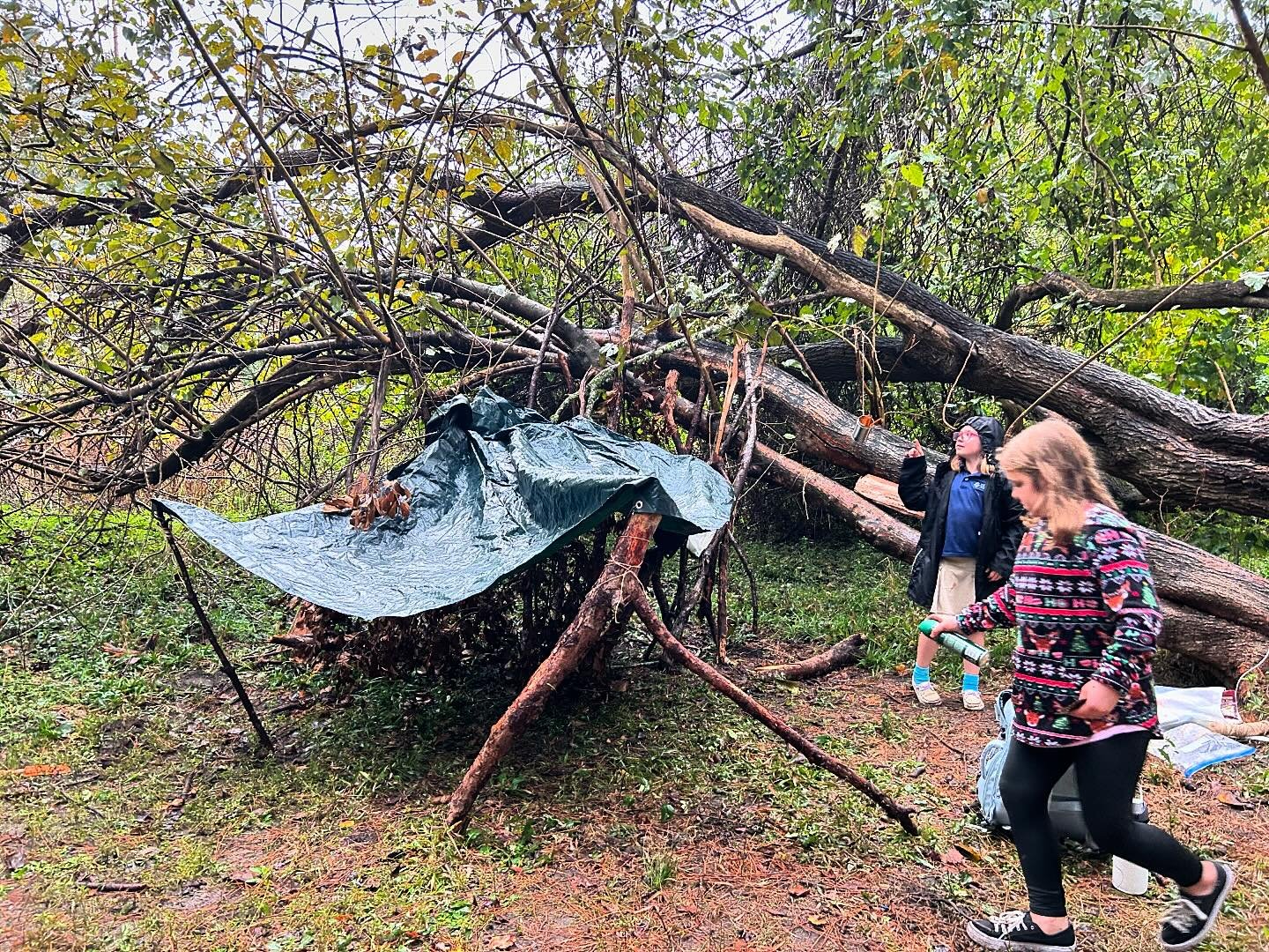 The storms last Thursday sparked our creativity to build a shelter for us to play under! These girls took the lead on designing an entire blueprint for our &ldquo;tarp home&rdquo;: We had two bedrooms, a doorbell, a kitchen and stove, and a bathroom 