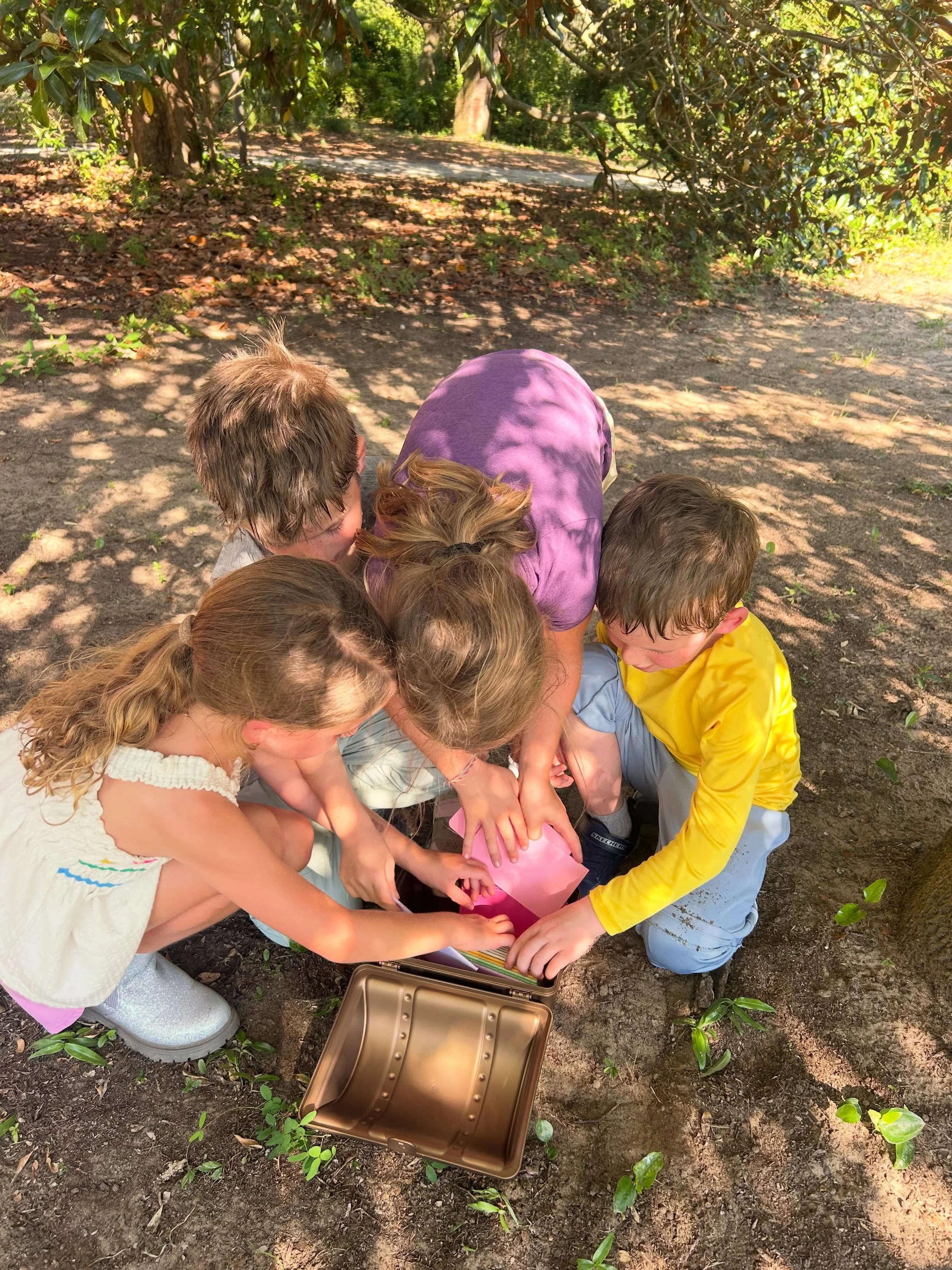 On a treasure hunt!! Through completing a series of missions that required some problem-solving, collaboration, and teamwork, we found a treasure hidden high up in a tree!