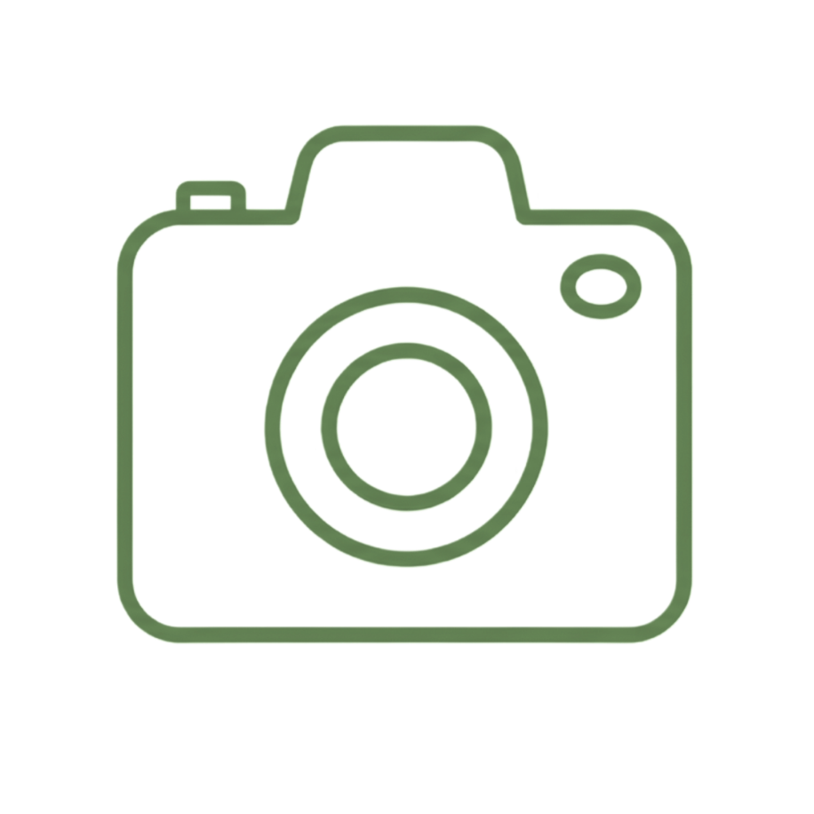Neon outline of a camera icon on a black background.