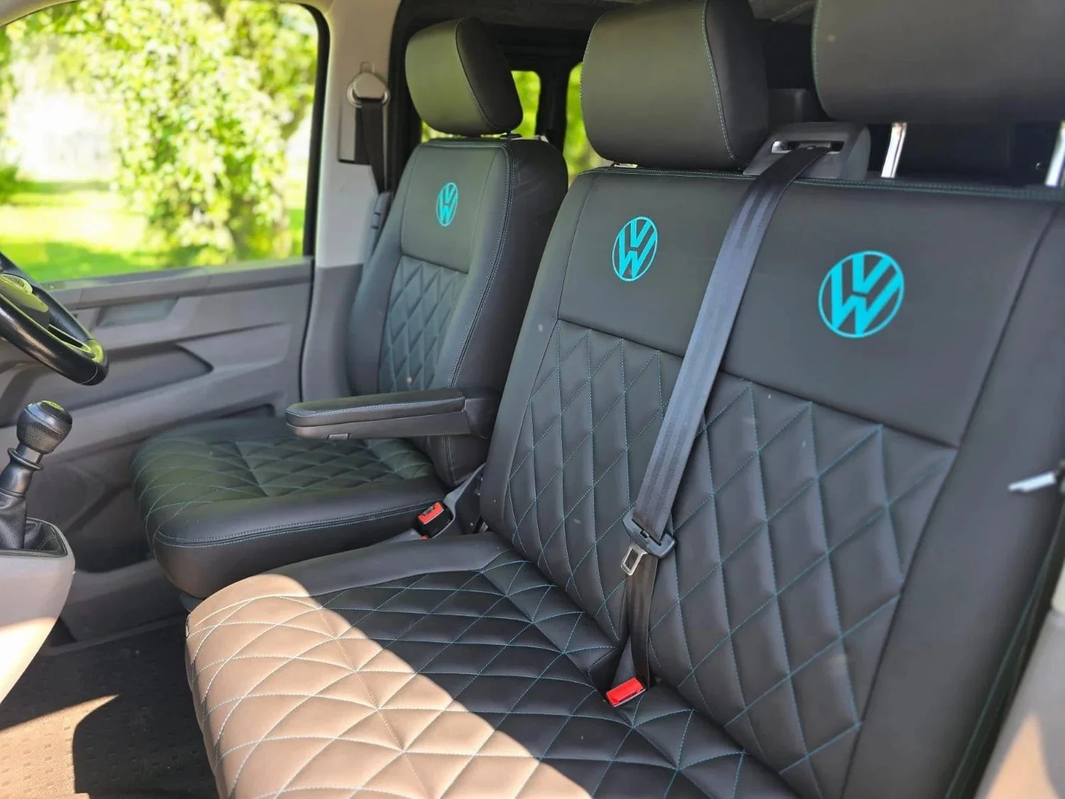 Custom campervan seat cushions and upholstery designed for a comfortable van interior.