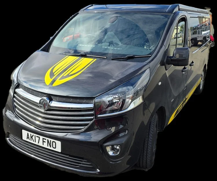 Yellow and black custom Vauxhall Vivaro campervan exterior