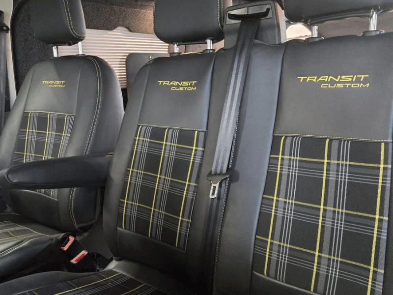 Front seating area inside Ford Transit Custom camper conversion