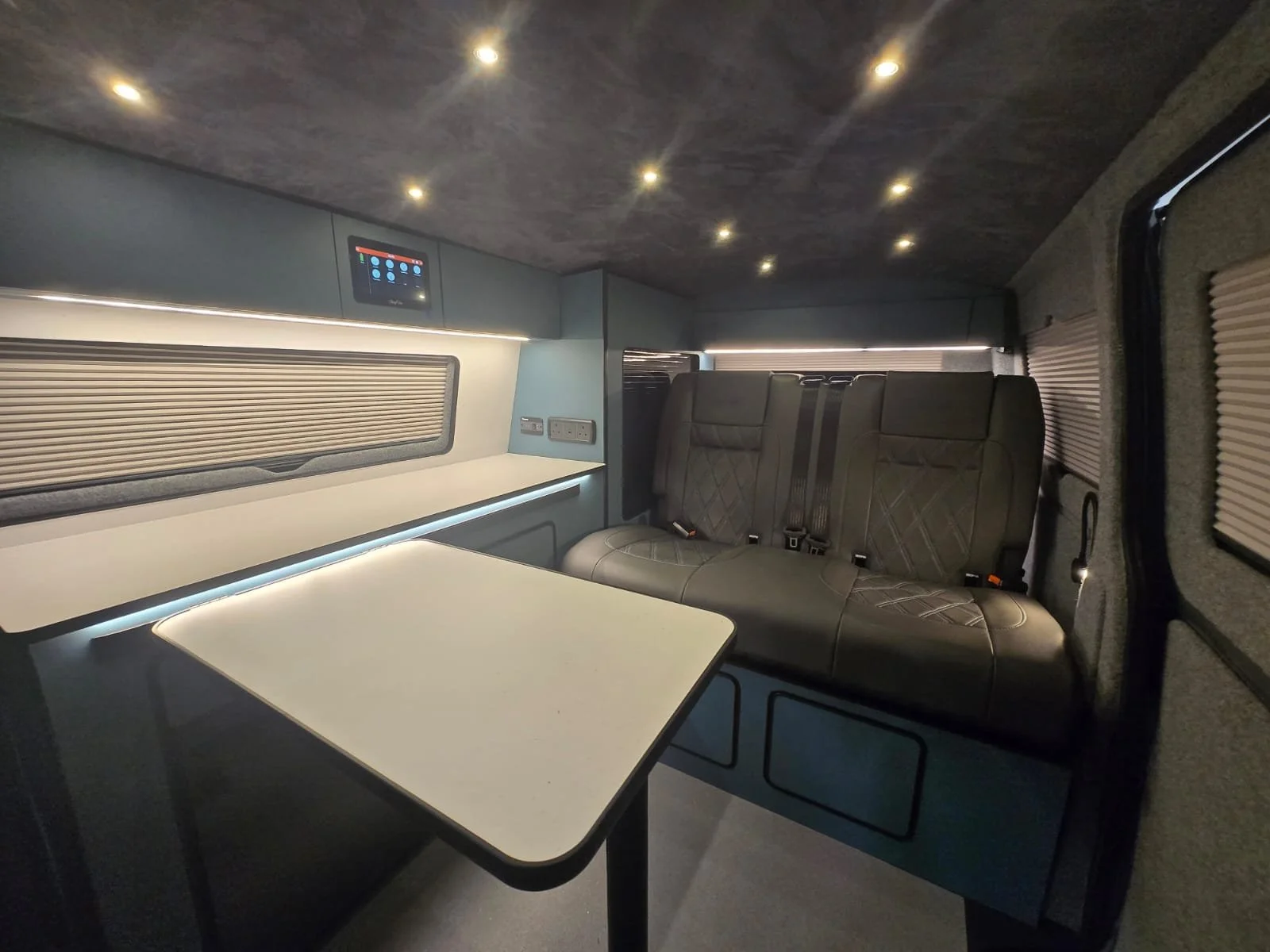 Custom Cabinets with Table, Vanshades and Mini LED Lights.jpeg