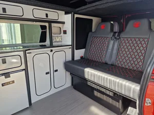 Custom kitchen cabinets and storage in a Vauxhall Vivaro campervan