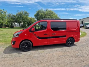 Custom Vauxhall Vivaro campervan side view with upgraded styling
