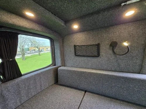 VW T6.1 campervan conversion with U-shaped seating area