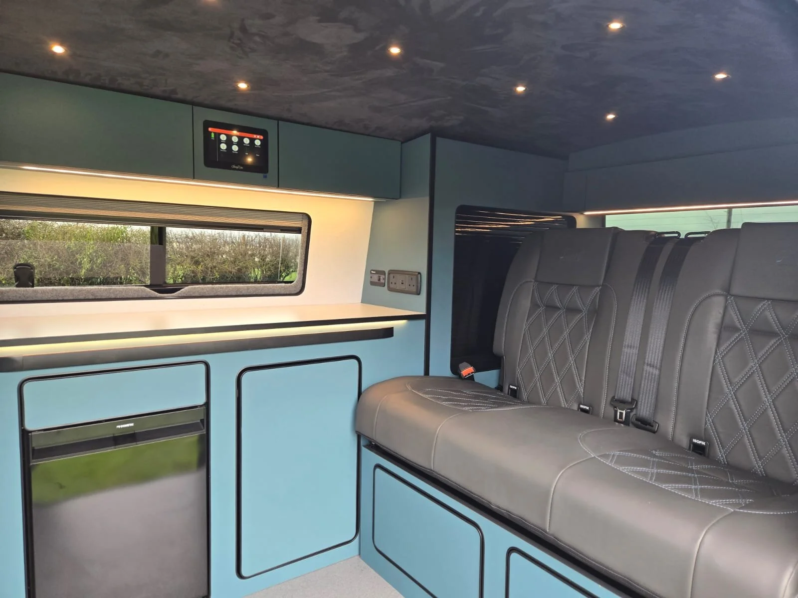 Custom Cabinets with Small LED lights in suede liner.jpeg