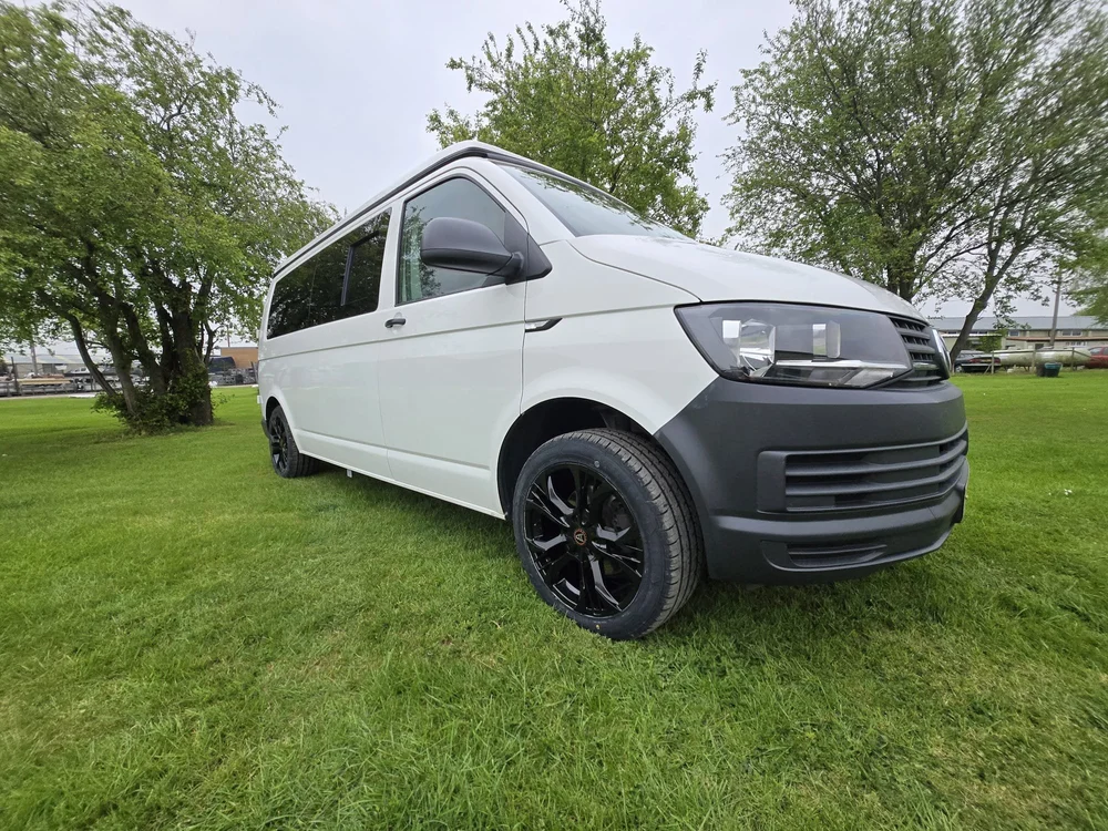 Black gloss alloy wheels fitted to a VW T6.1 custom van enhancing the exterior stance