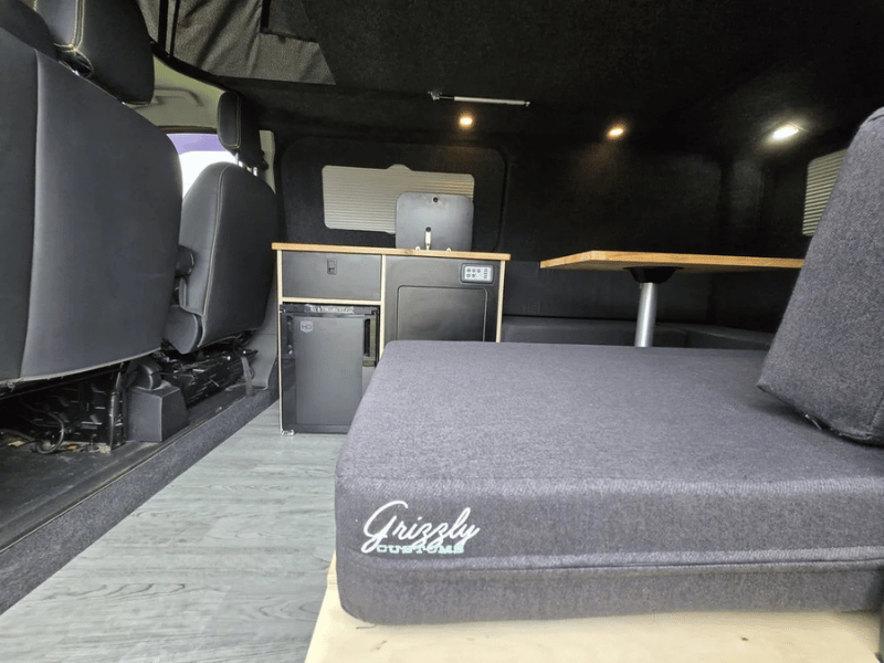 Ford Transit Custom camper conversion seating and sleeping area