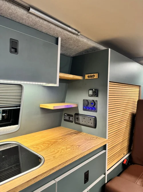 Solid oak worktop and tambour door in bespoke VW T6.1 camper conversion