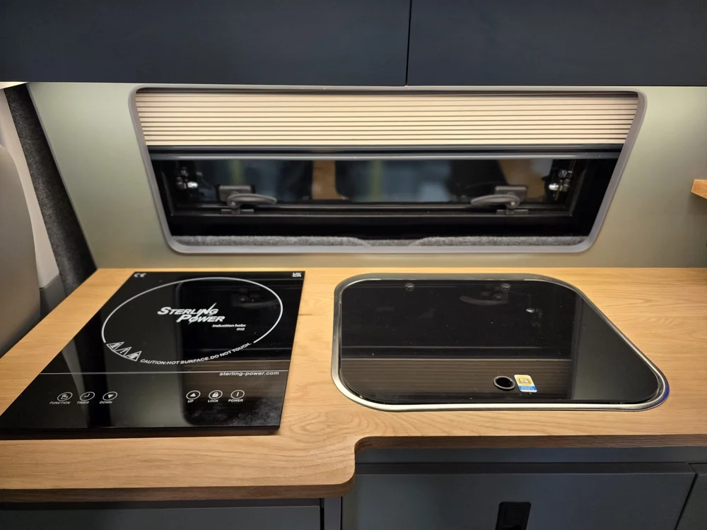 VW T6.1 campervan induction hob and sink in gas free custom van conversion