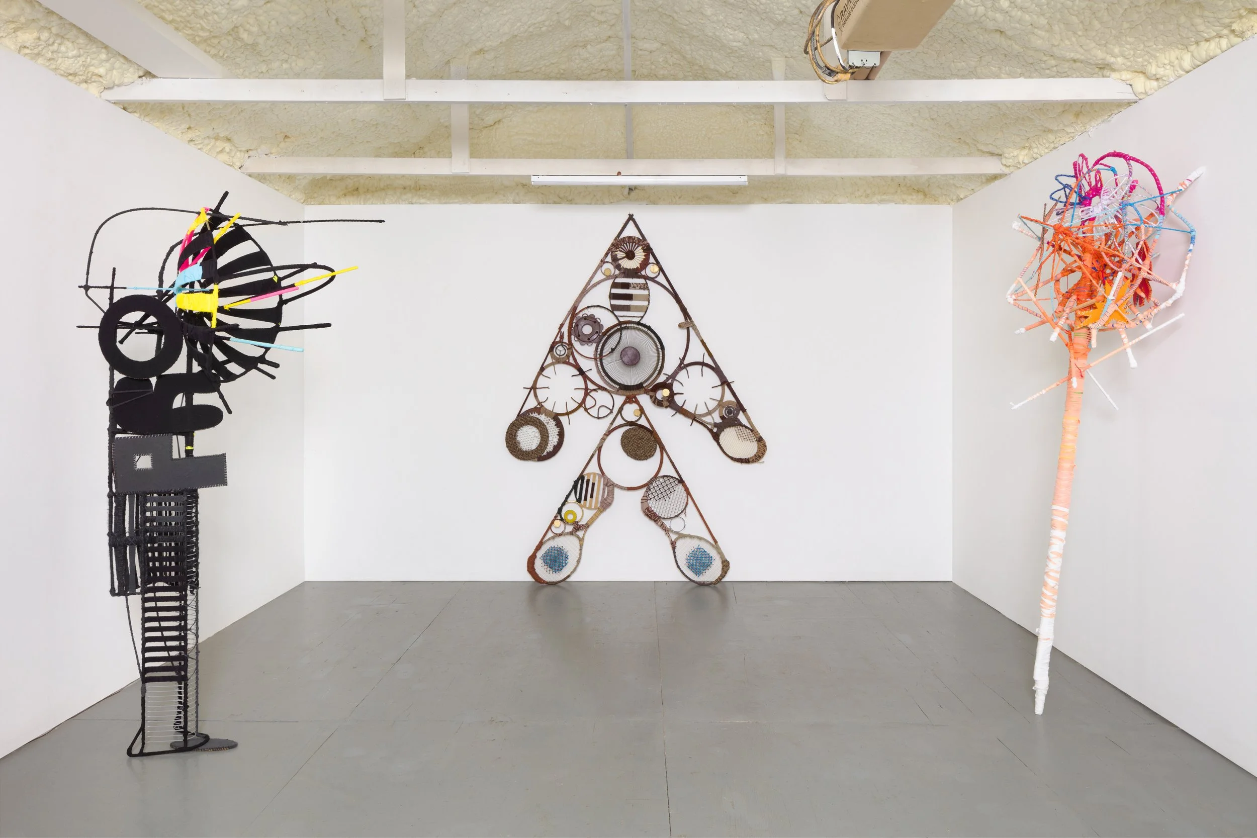 The Projector,  2024  
Found objects and repurposed textiles  
79 x 19 x 40 inches
 
 The Second Overseer,  2024 
Found objects and repurposed textiles 
111 x 65 x 4 inches
 
 The Spark,  2018-2023 
Found objects and repurposed textiles 
88 x 32 x 3