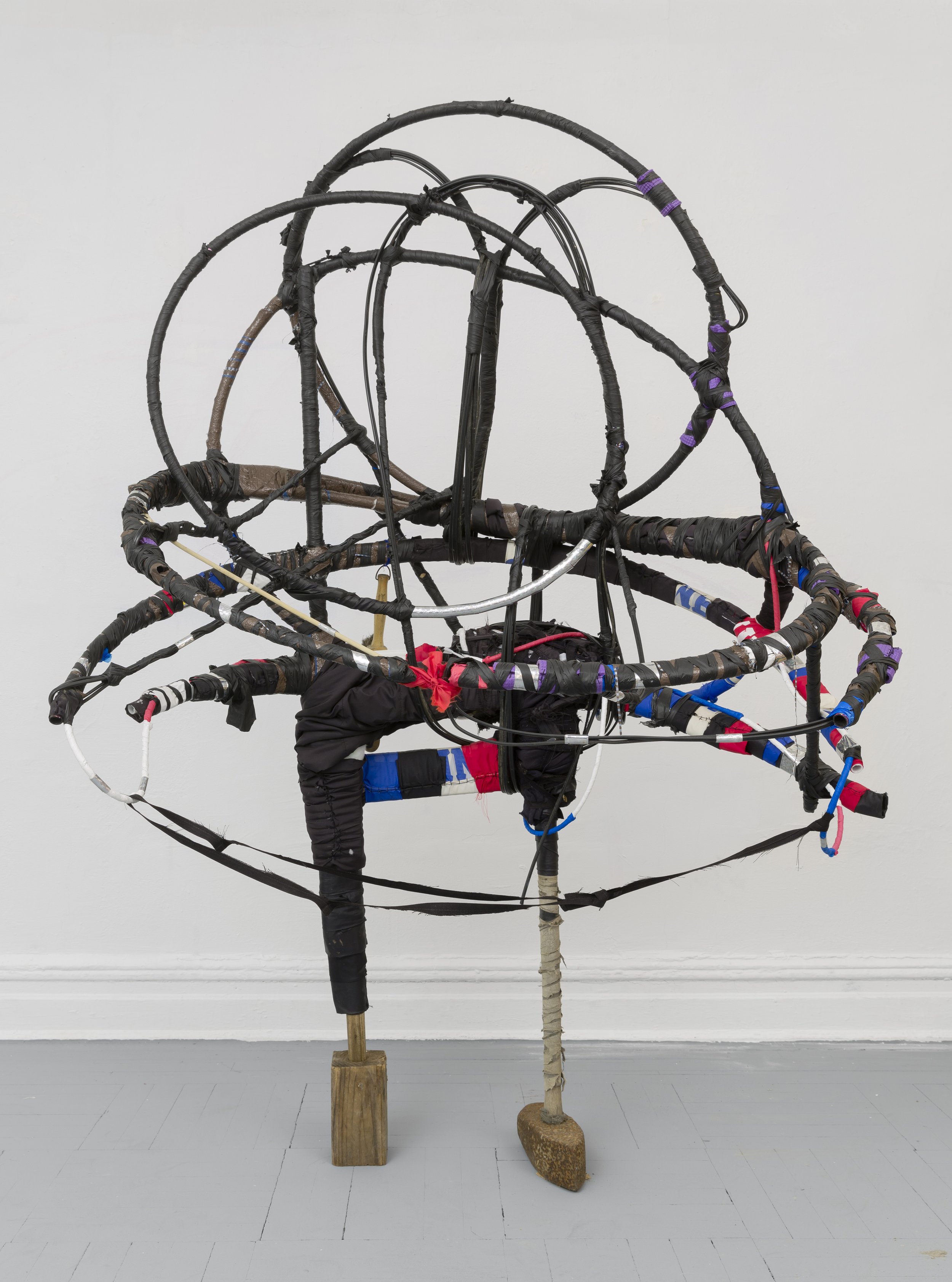 The Protector, 2018 found objects and repurposed textiles, 84 x 48 x 48 inches