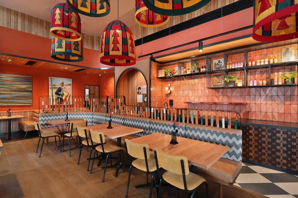 Restaurant table settings with warm colours