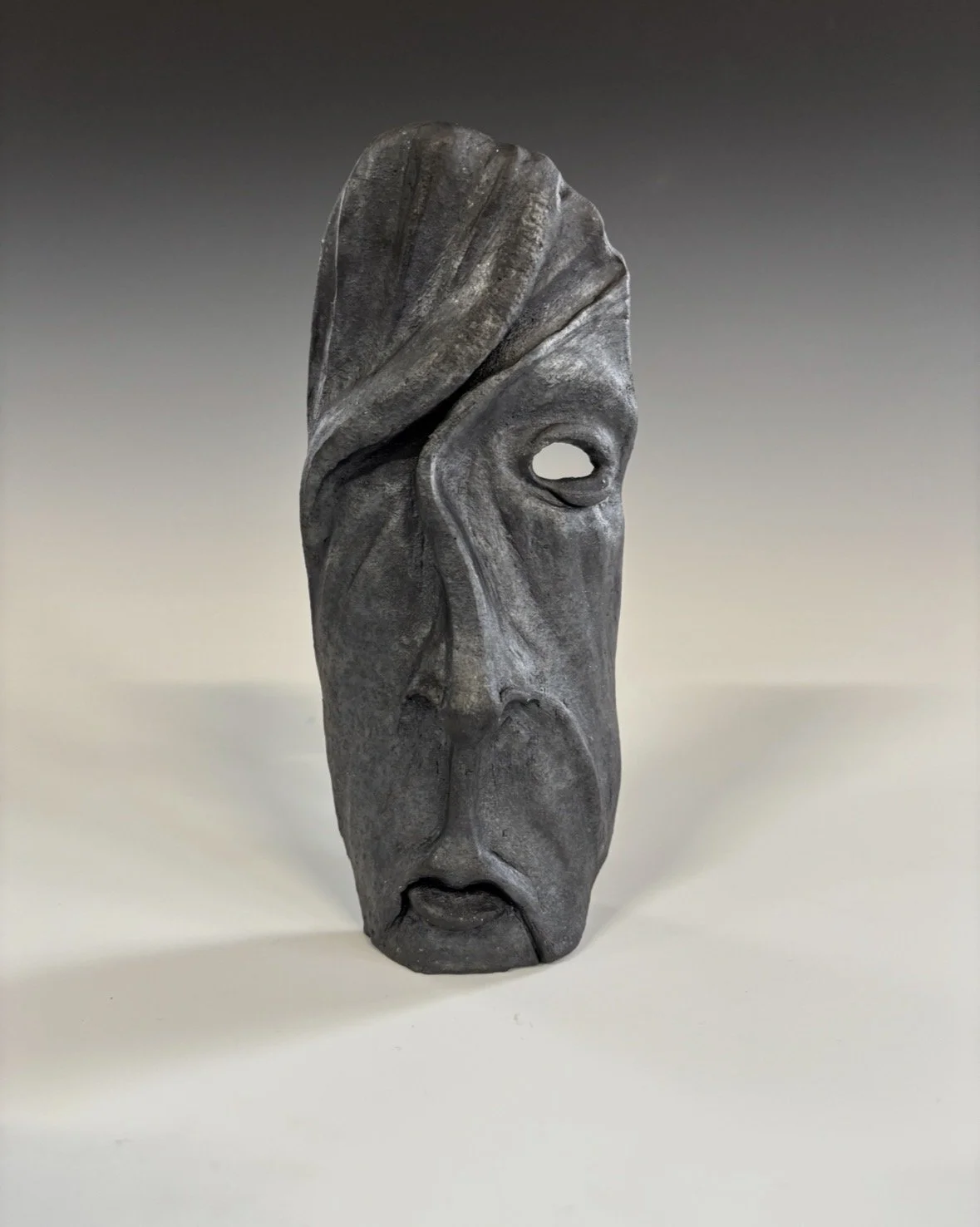 UNTITLED, 2025, smoked raku ceramic 