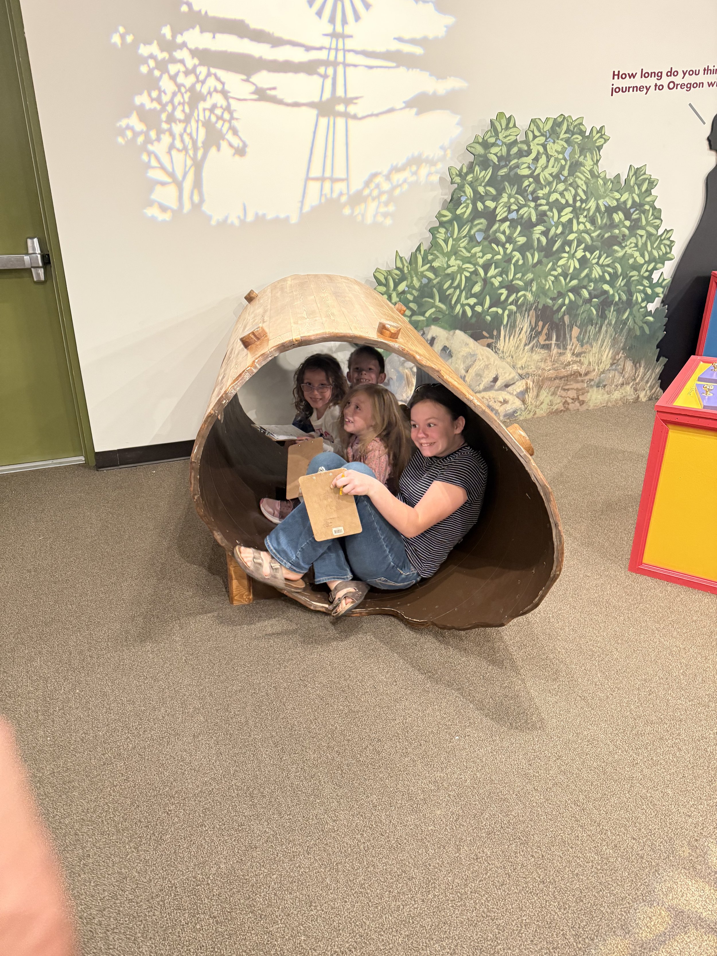 kids playing at the oregon trail intpretive center