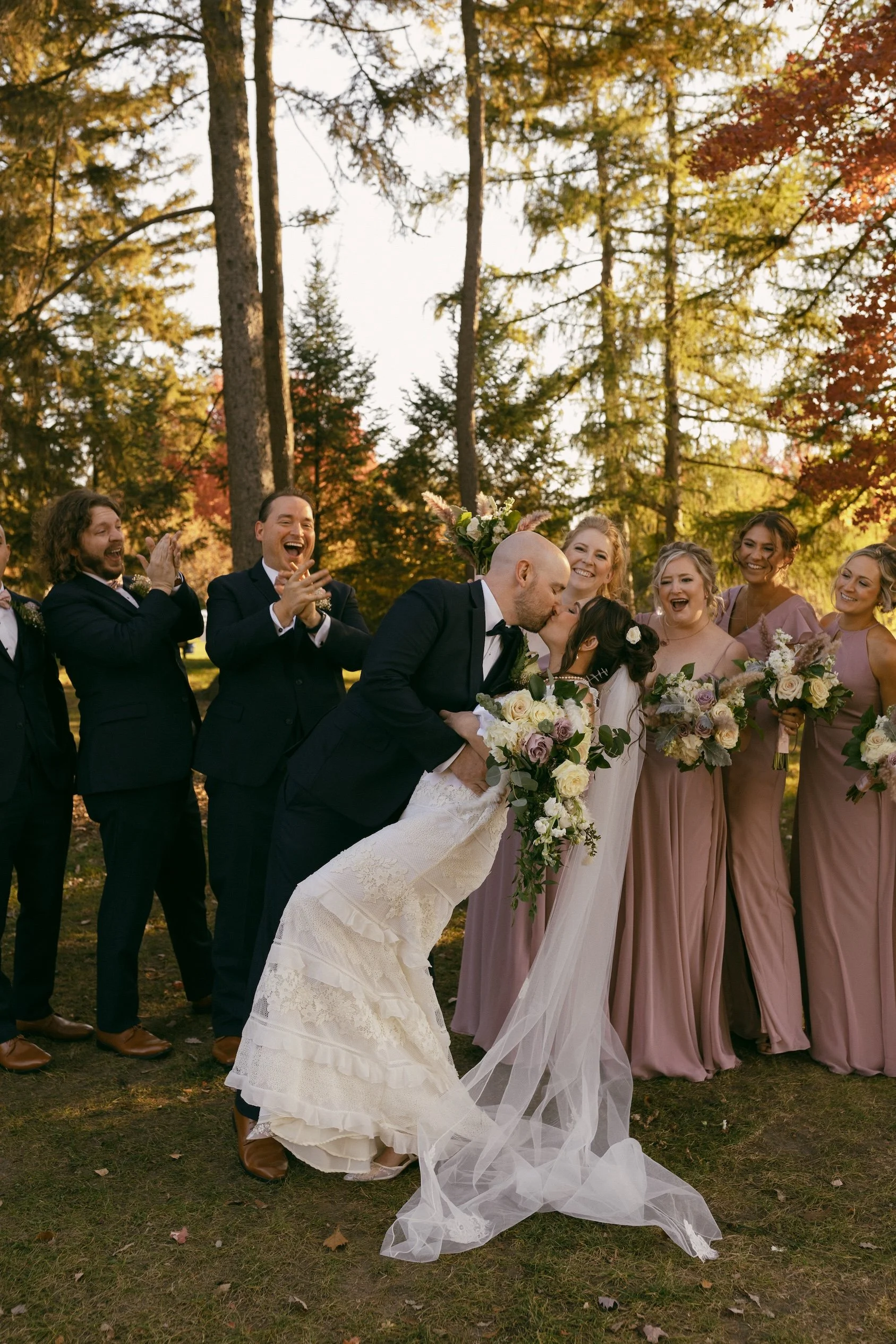 Laurie’s customers, Fernando and Kate embracing by the lake on their wedding day.