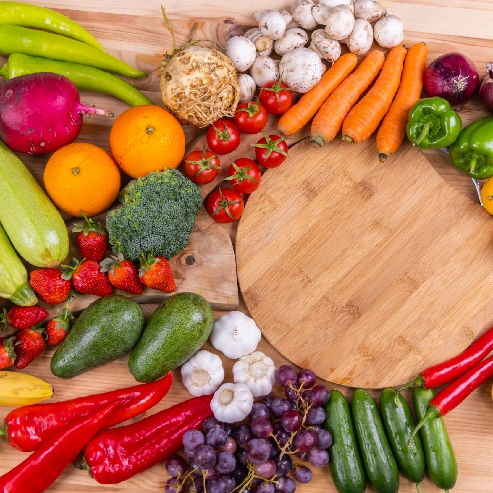 picture of fruit and vegetables around a chopping board symbolising vitamin support holistic health coeliac gluten free