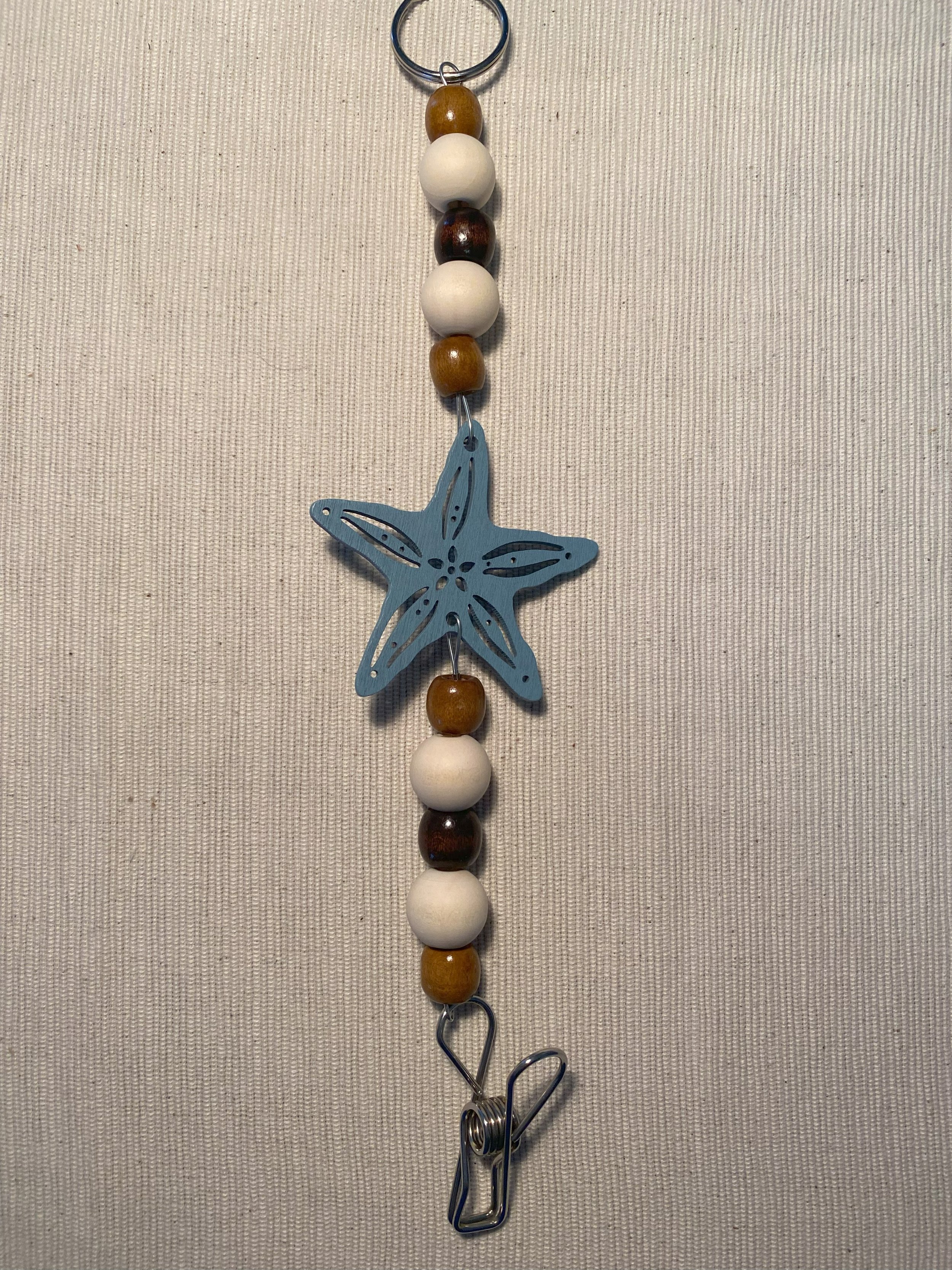 Light Blue Starfish Mozzie Coil Hanger with Light Coffee Beads and a Dark Coffee Feature Bead