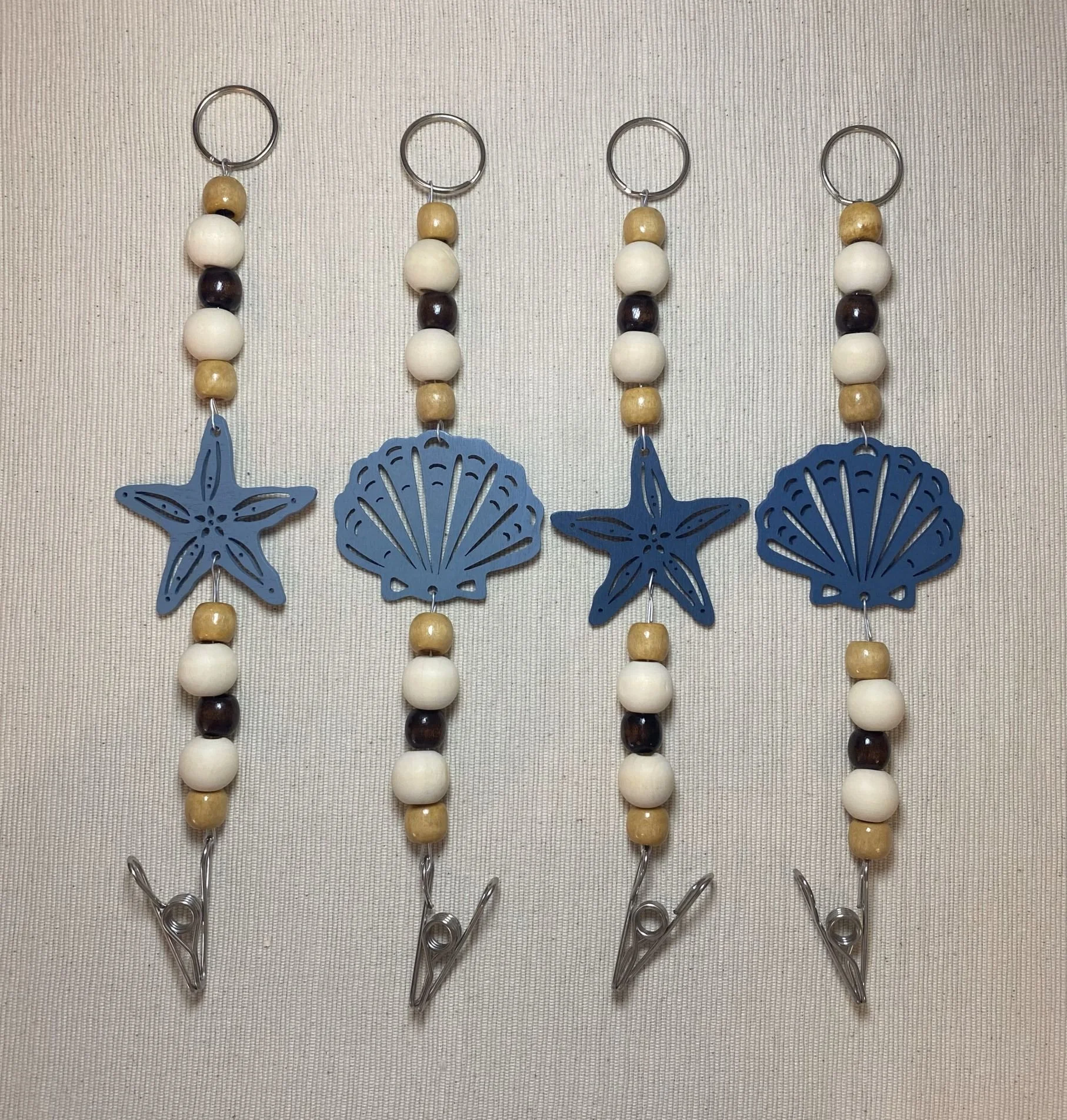 Shells and Starfish Mozzie Coil Hanger with Pale Coffee Beads and Dark Coffee Feature Bead
