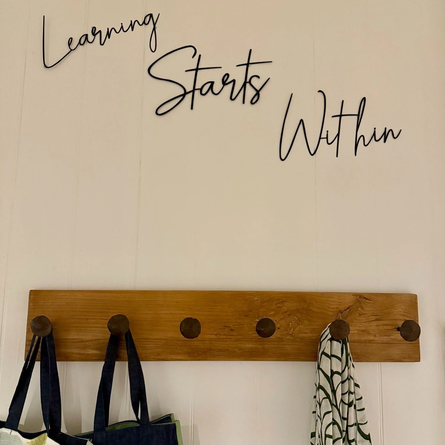 Learning start within sign_bag rack.jpg