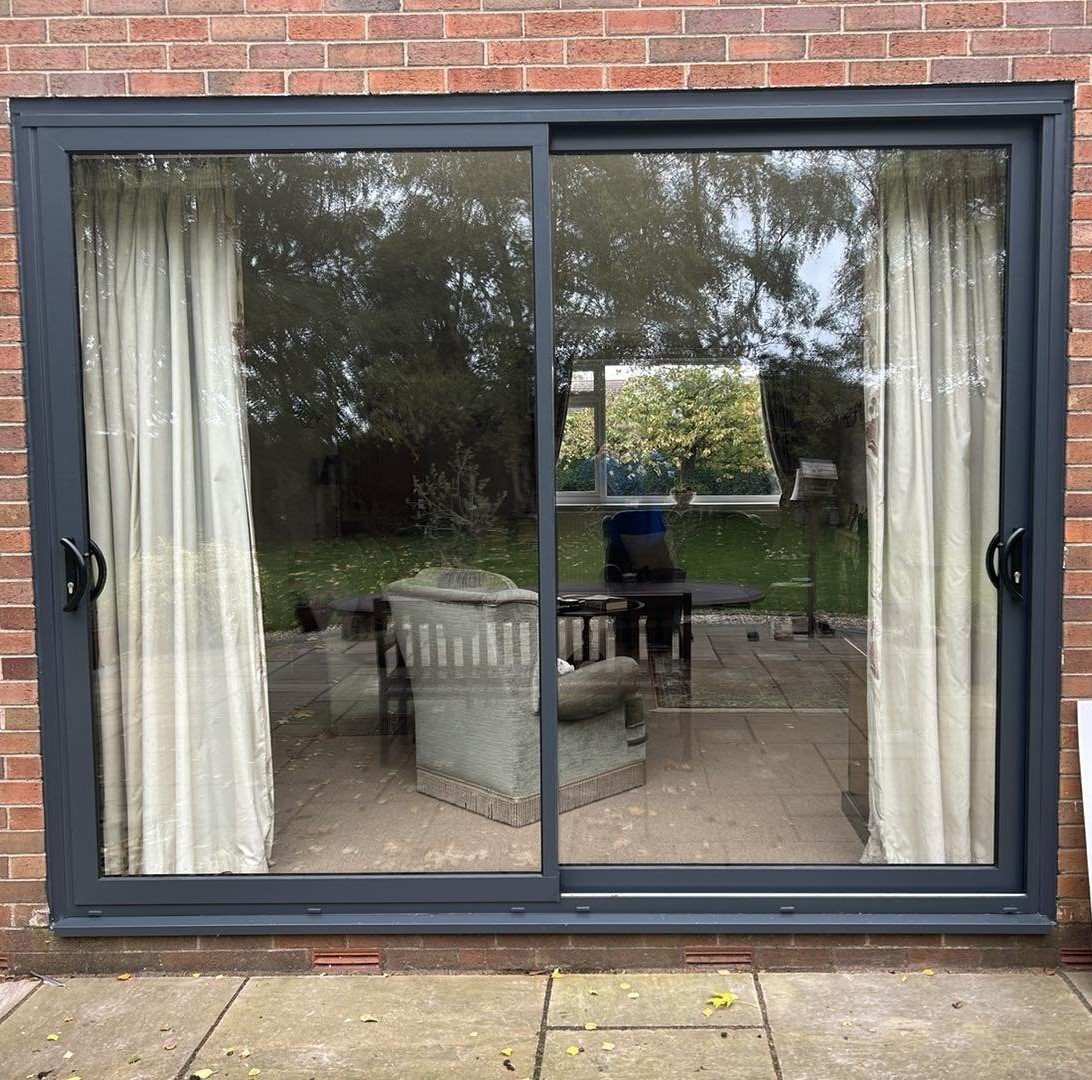 ALUMINIUM ANTHRACITE GREY ON WHITE PATIO DOOR REPLACEMENT