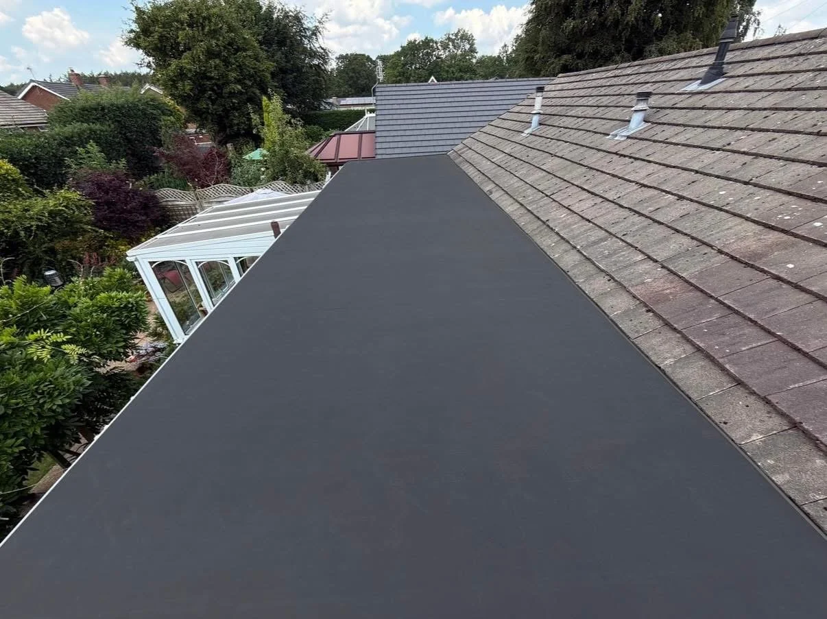 FIRESTONE RUBBER EXTENSION FLAT ROOF INSTALLATION