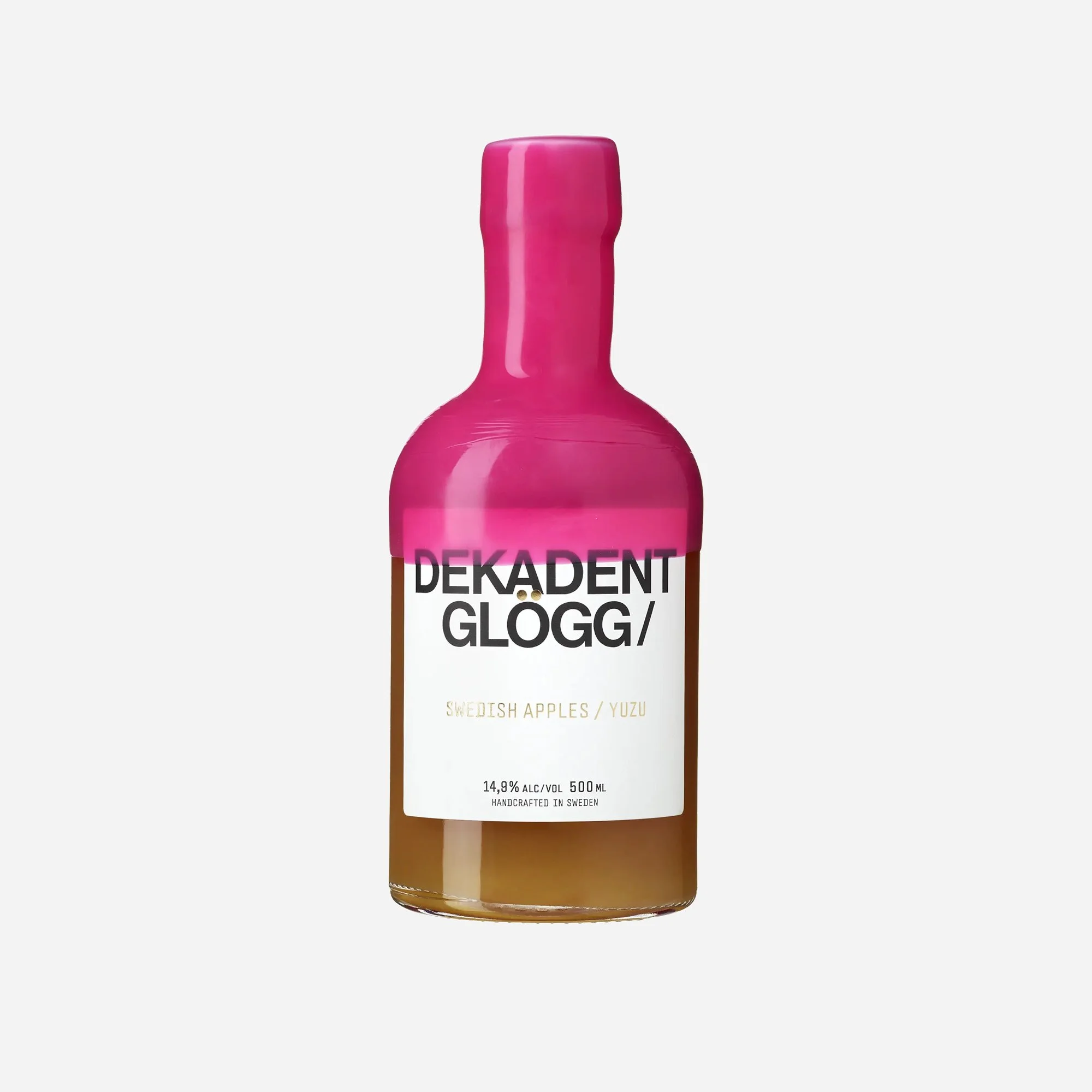 Pink bottled beverage labeled Dekadent Glögg with Swedish apples and yuzu flavor, 14.9% alcohol, 500 ml, handcrafted in Sweden.