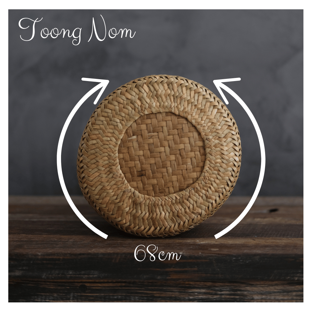 Bottom view of the basket displaying circular base and weave pattern, 68cm circumference.