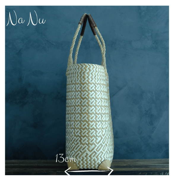 Side profile of the Na Nu Geometric Tote with 13cm depth noted. Highlights the structured silhouette and reinforced corners.