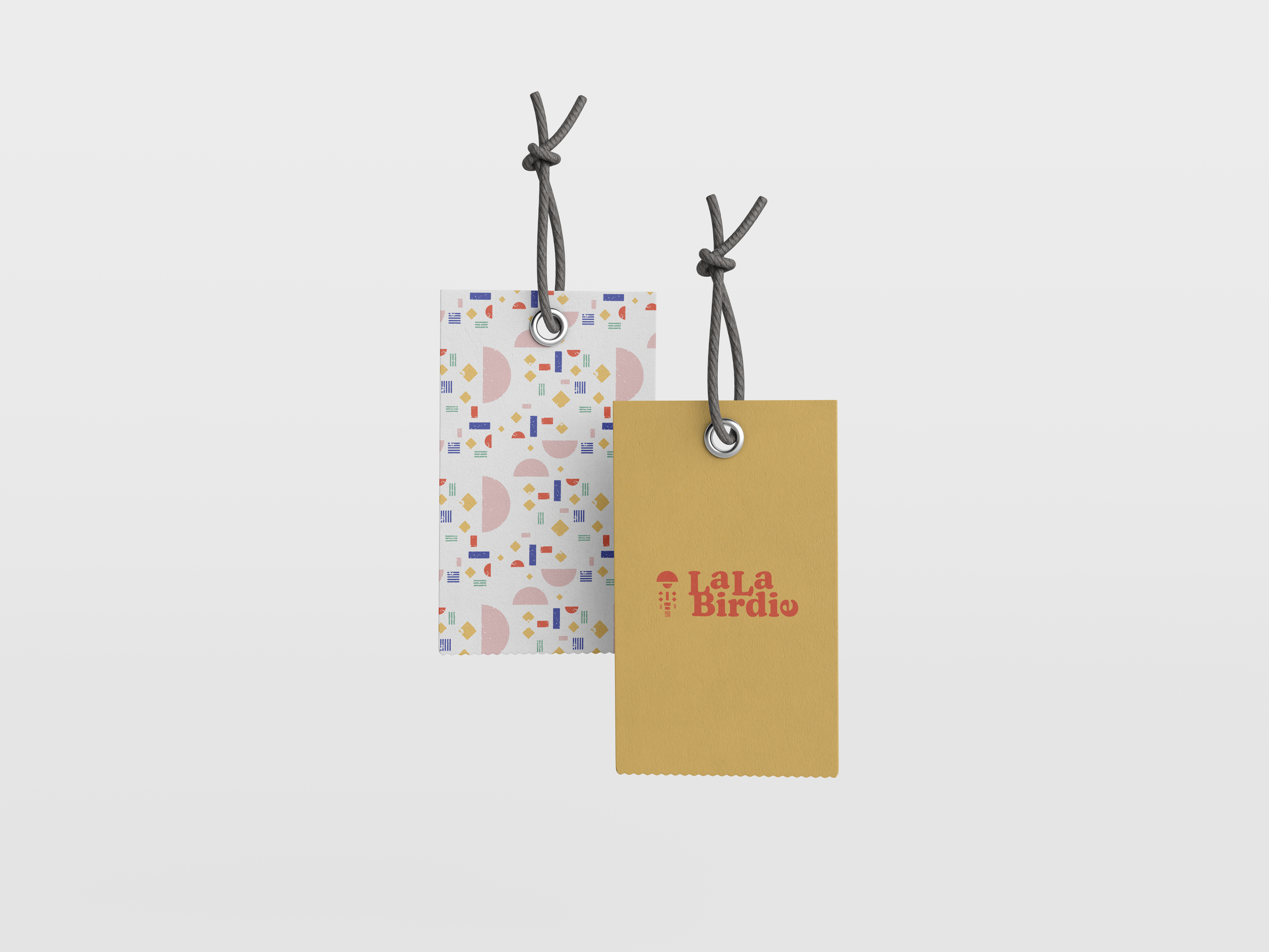 LaLa Birdie Clothing Tags Mockup.png