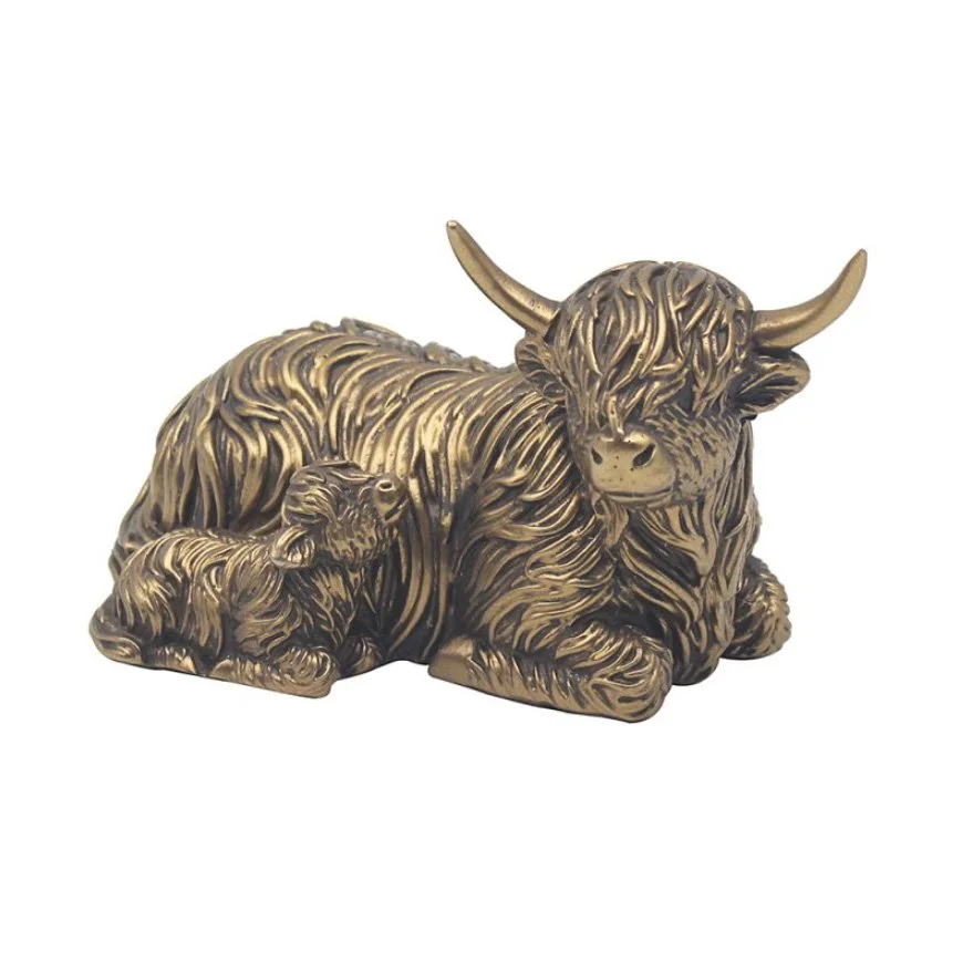 bronze-highland-cow-and-calf-laying.jpg