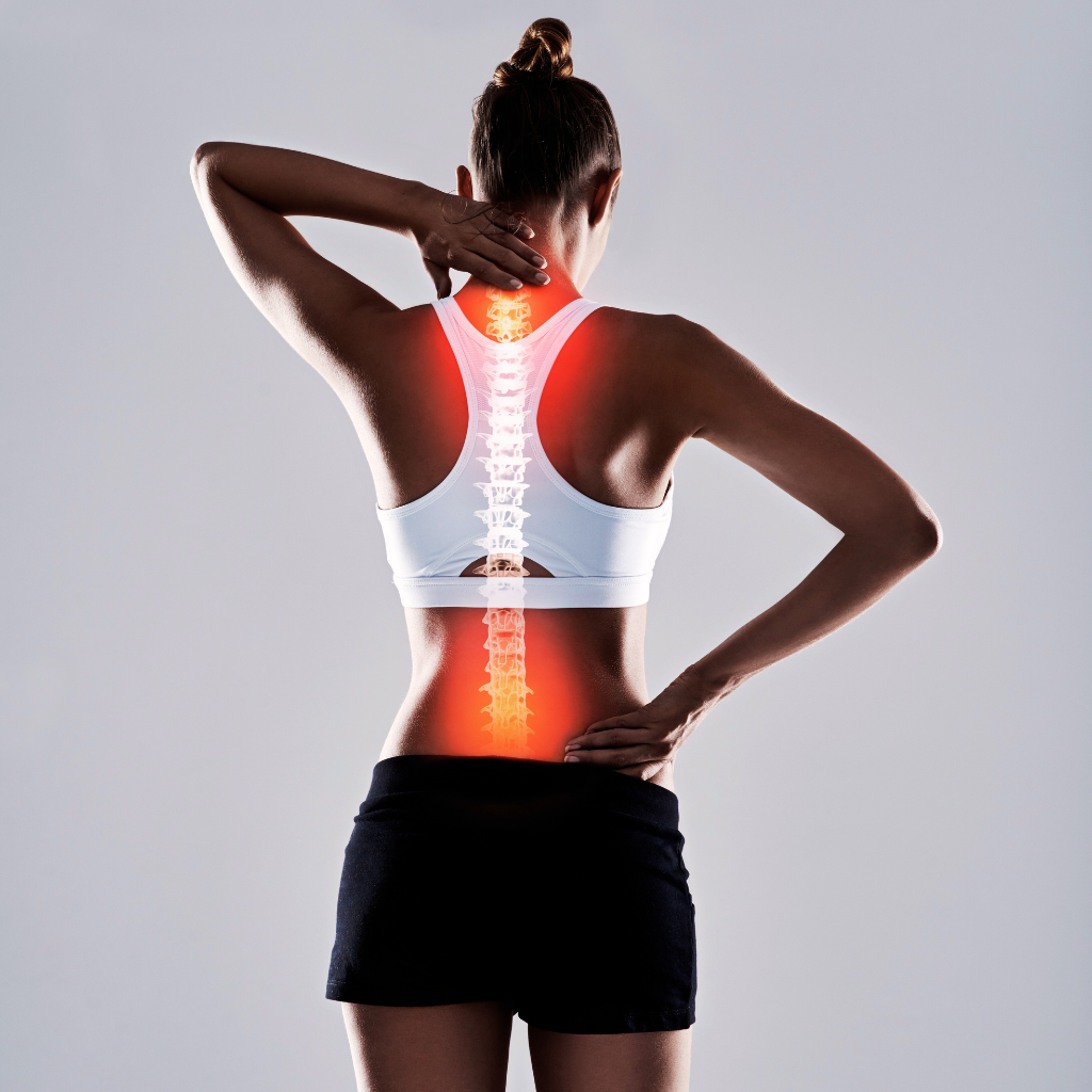 Back side of female athlete with spine illuminated in red