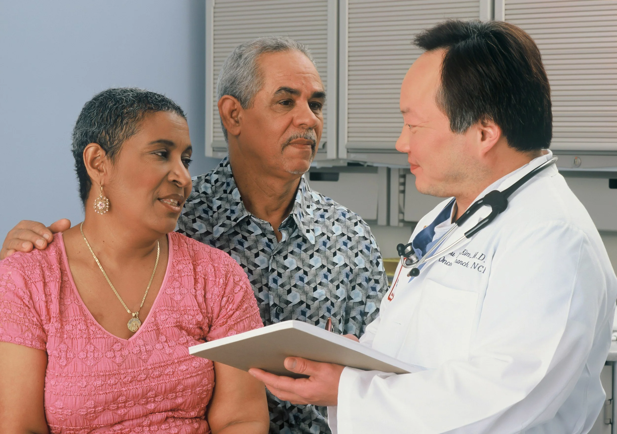 patients discussing unmanaged symptoms with doctor