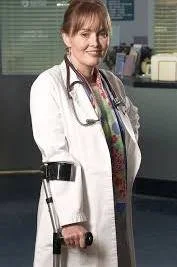 Laura Innes as Dr. Kerry Weaver in ER