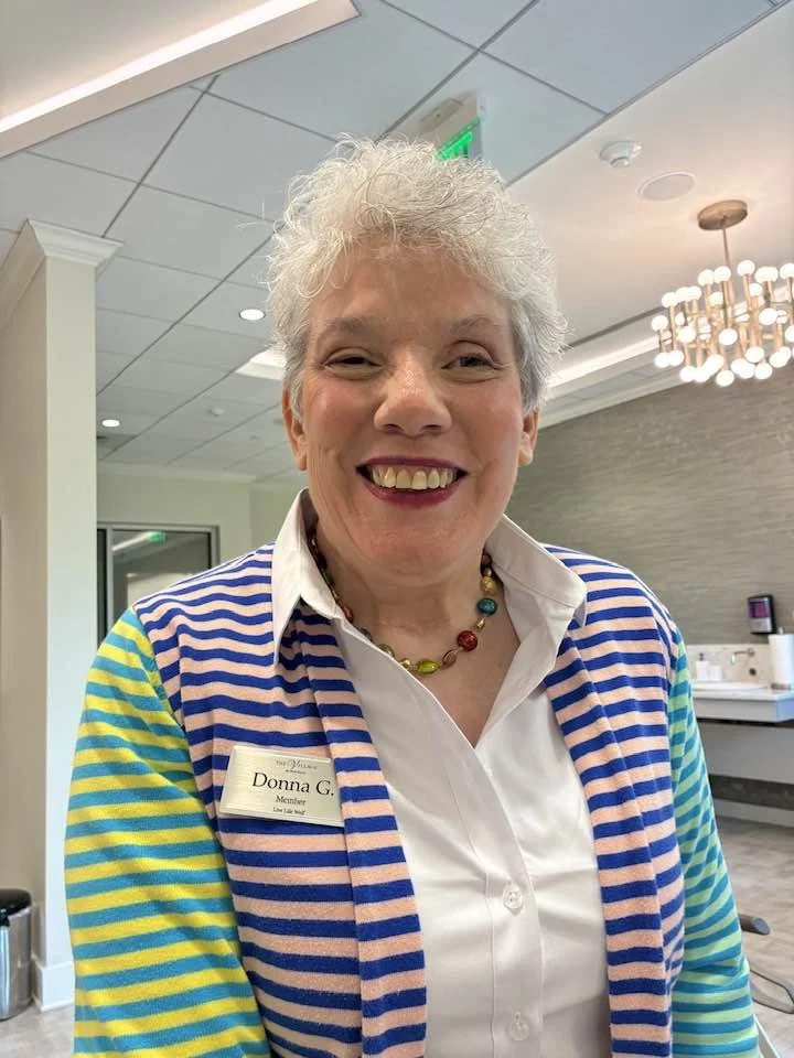 Donna R. Gore in a striped sweater