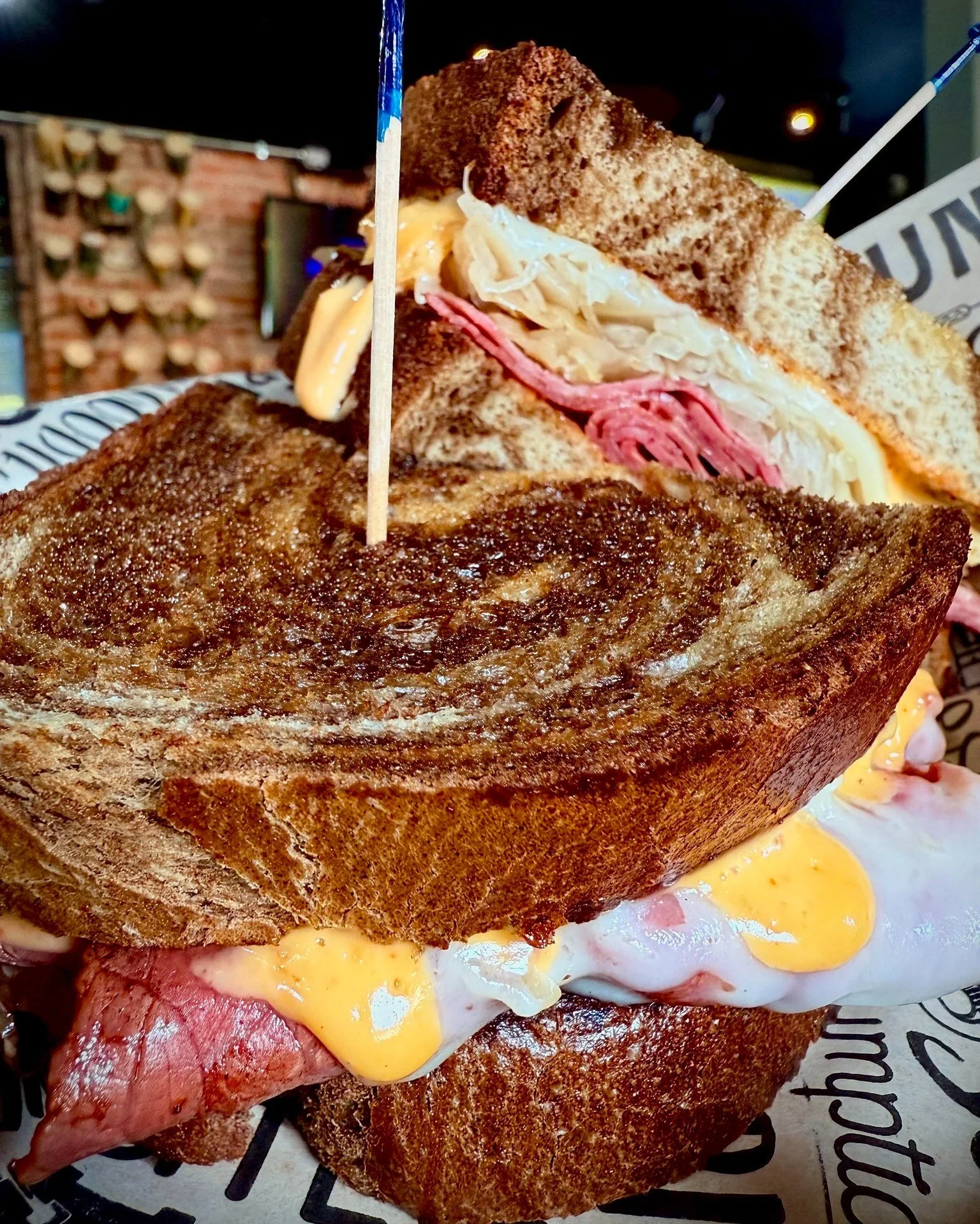 On top of all the Fall festivities going on around here, you'll be able to get this beautiful 𝗥𝗲𝘂𝗯𝗲𝗻 S𝗮𝗻𝗱𝘄𝗶𝗰𝗵 that will be on the menu tomorrow for our 𝗙𝗮𝗹𝗹 𝗕𝗹𝗼𝗰𝗸 𝗣𝗮𝗿𝘁𝘆 (October 11th)! Corned beef, sauerkraut, Swiss cheese 