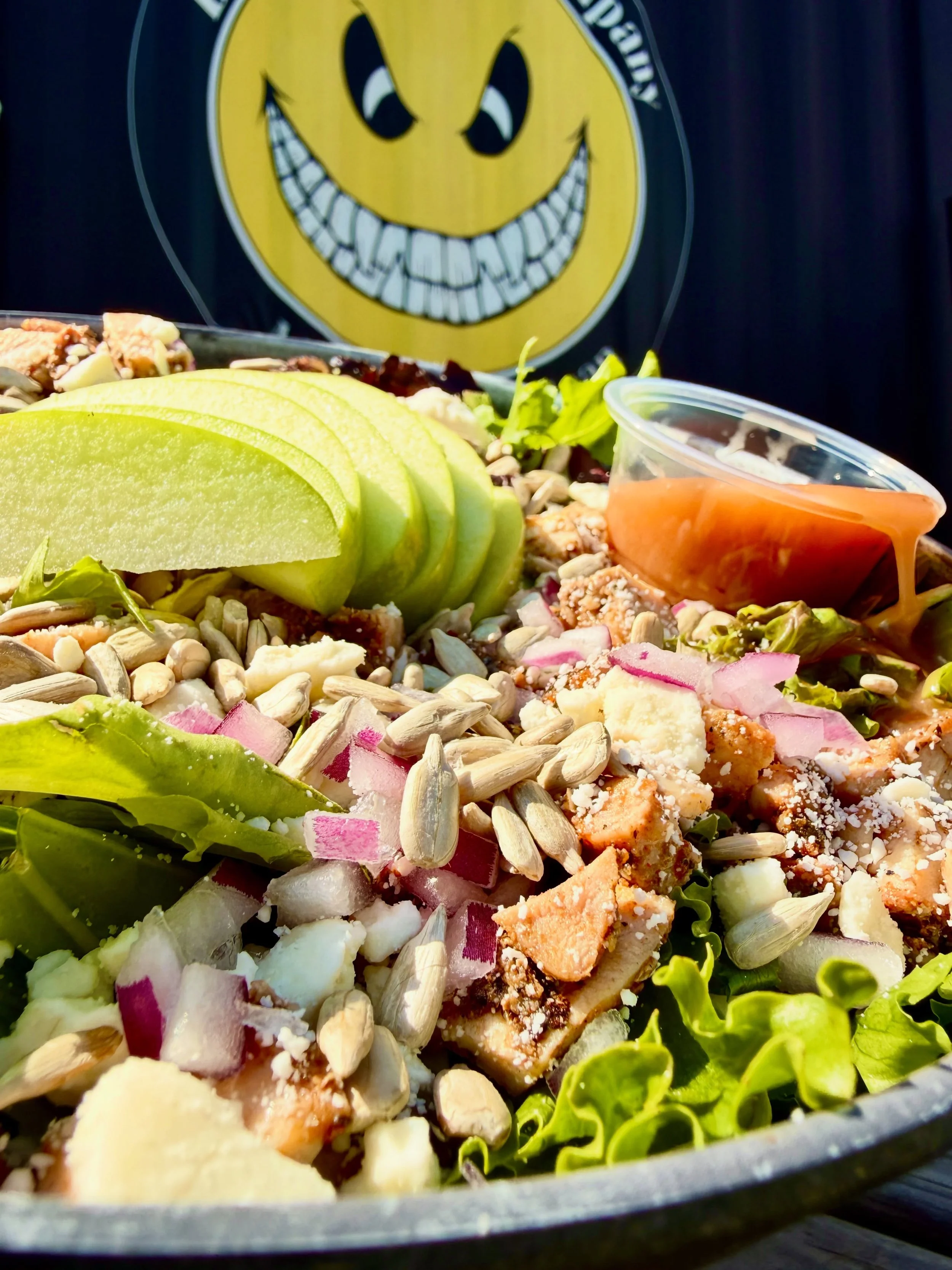 Ahhh spring 🌺 ☀️ Looking for something light and refreshing? Stop in and try our new 𝗦𝗽𝗿𝗶𝗻𝗴 𝗔𝗽𝗽𝗹𝗲 𝗦𝗮𝗹𝗮𝗱 full of chopped smoked chicken, sunflower seeds, red onion, feta cheese, and Granny Smith apples all on a bed of colorful spring 