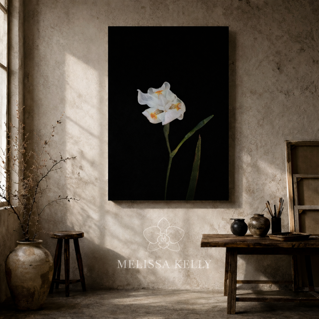 Large dark floral wall art above sofa in modern minimalist interior