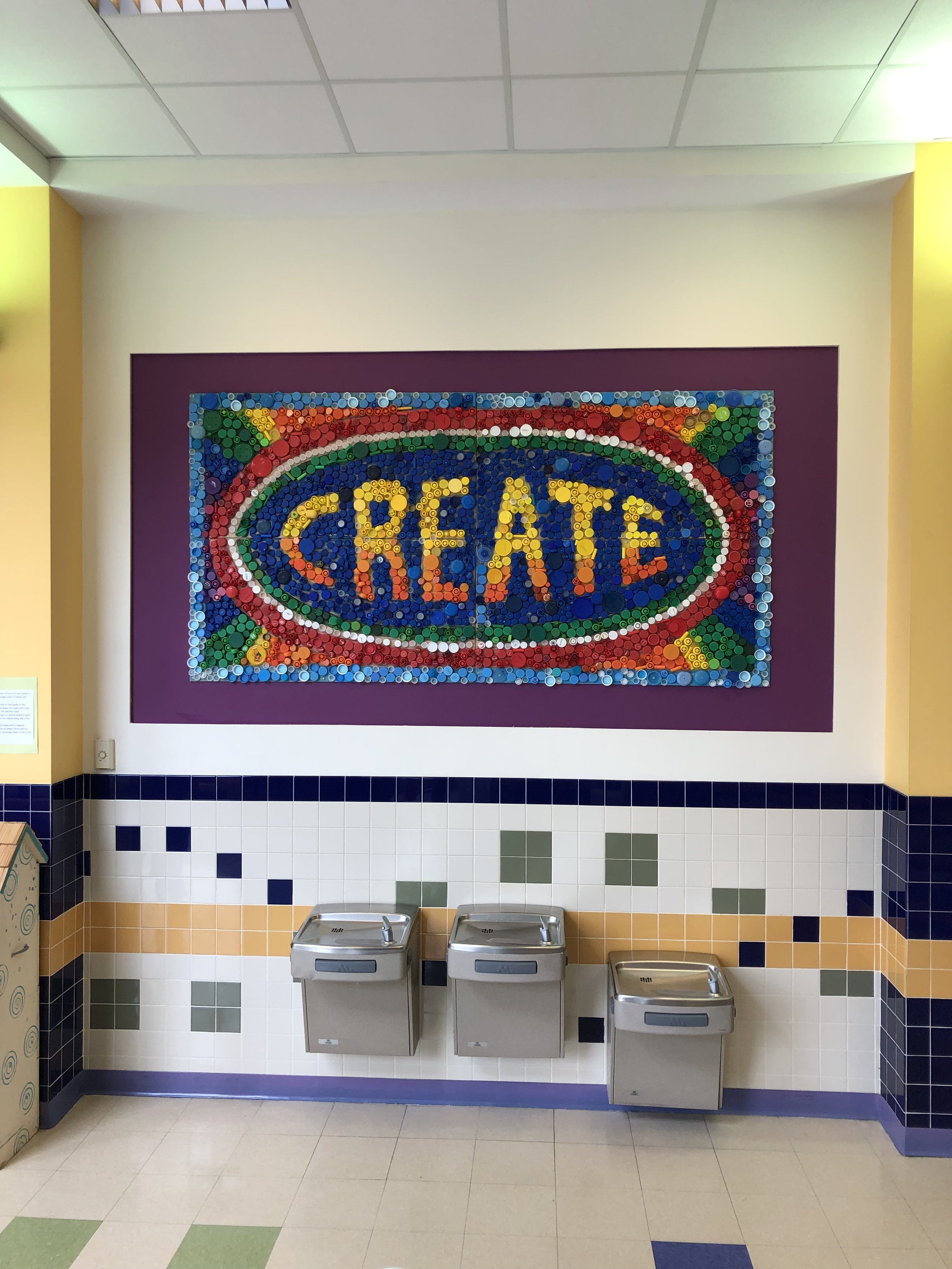 Create bottle cap mosaic installed.jpg