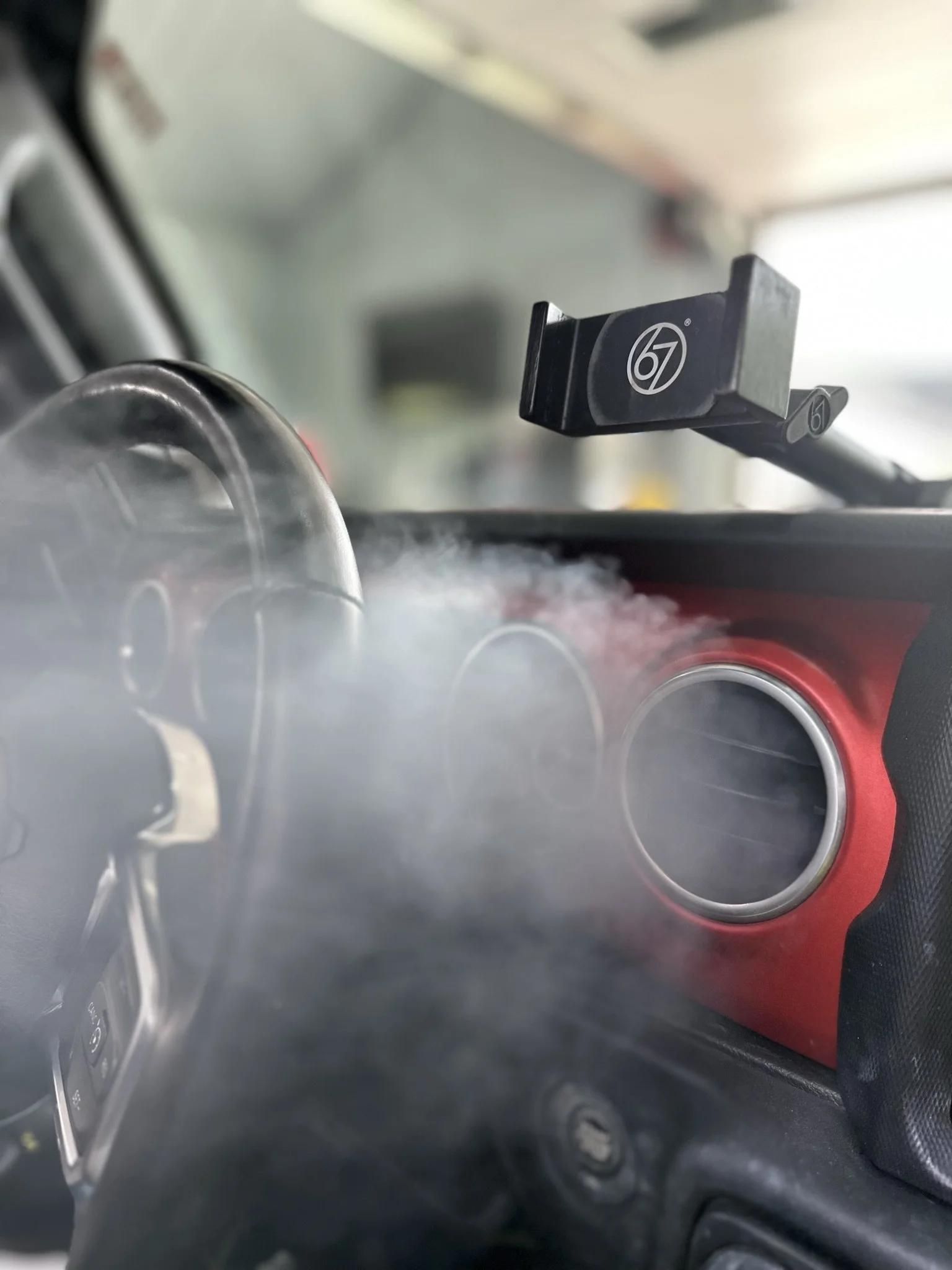 clean car interior with mist coming out vents