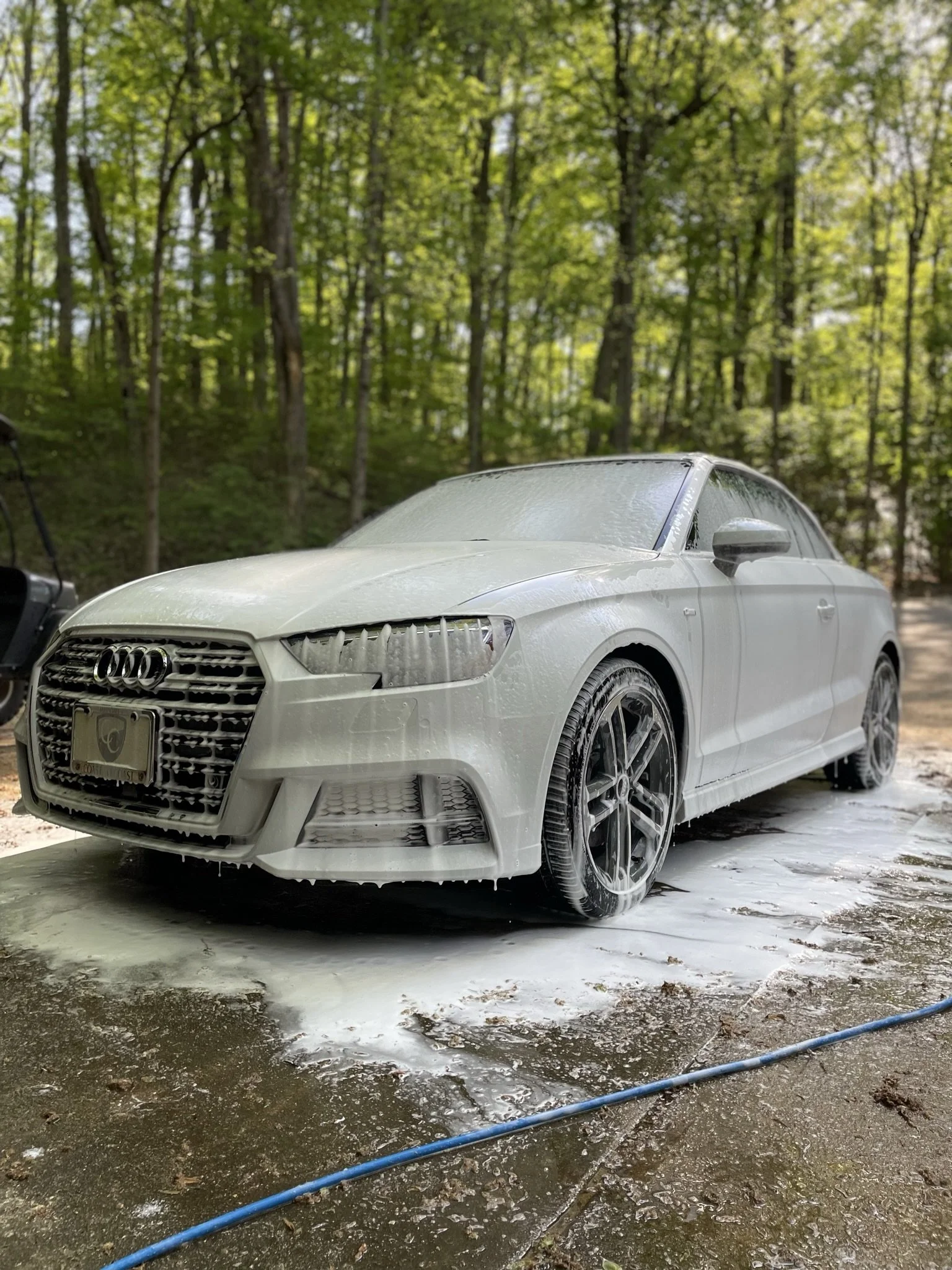 white car with soap suds