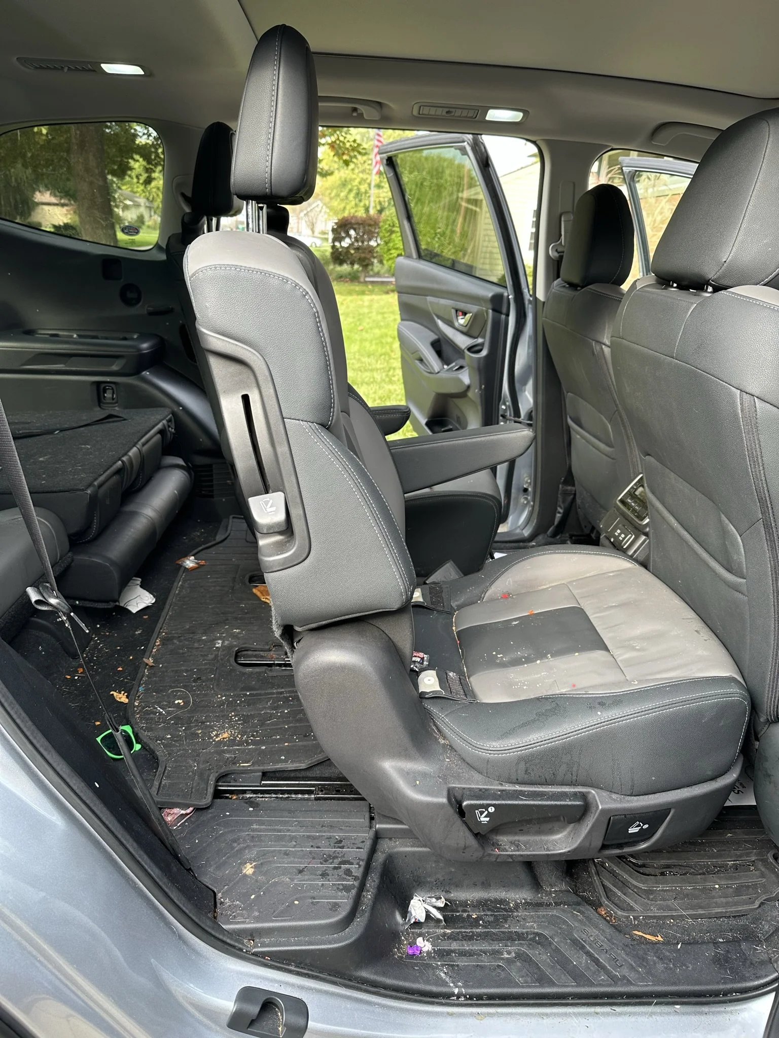 dirty back seat of van