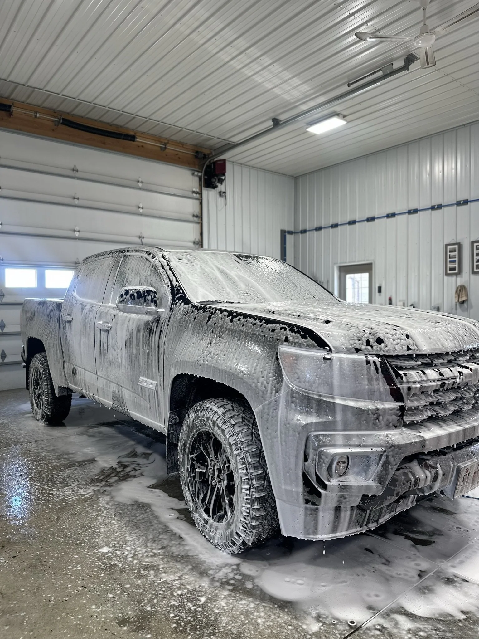 black truck with soap suds