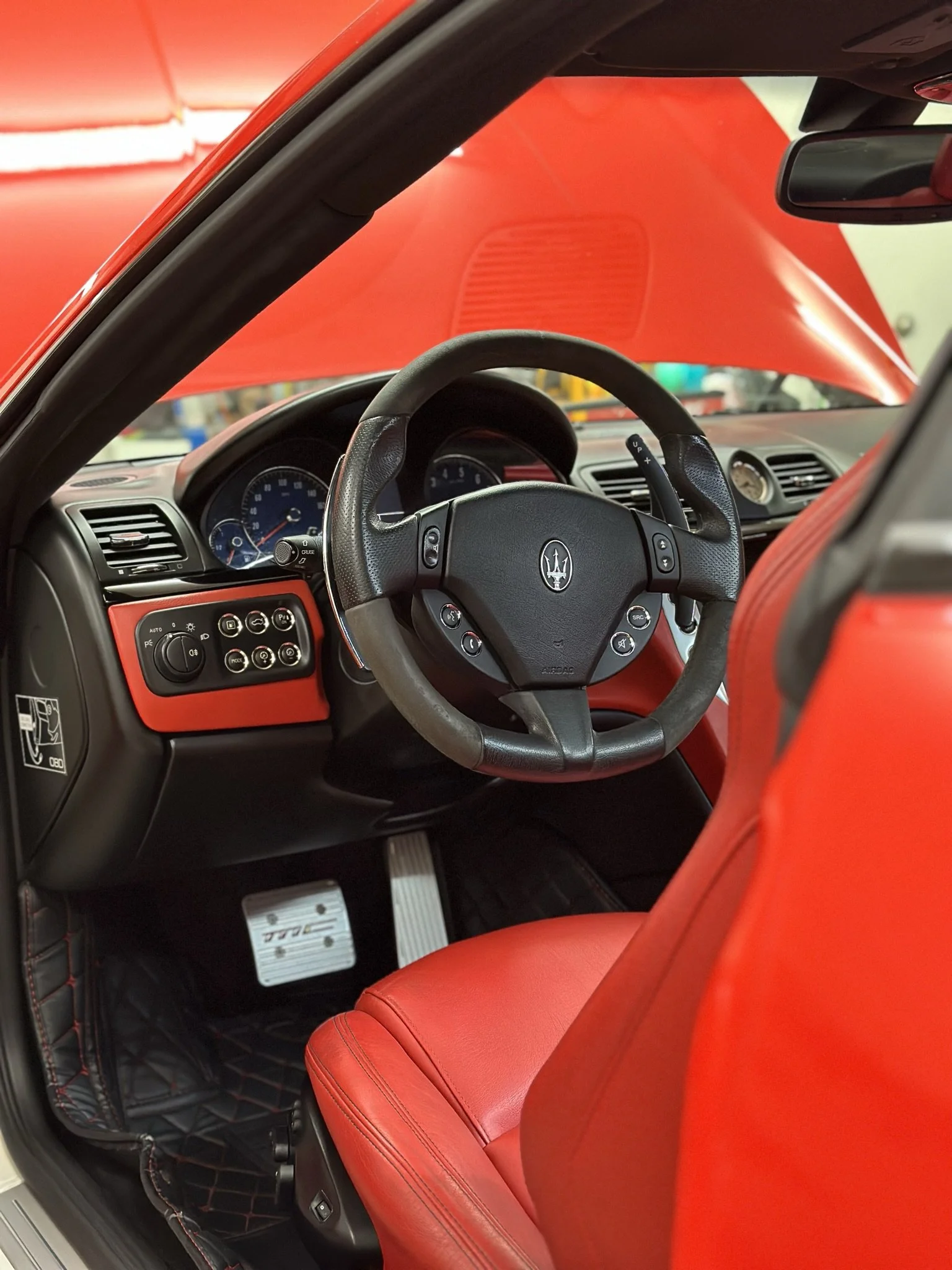 steering wheel of red clean car
