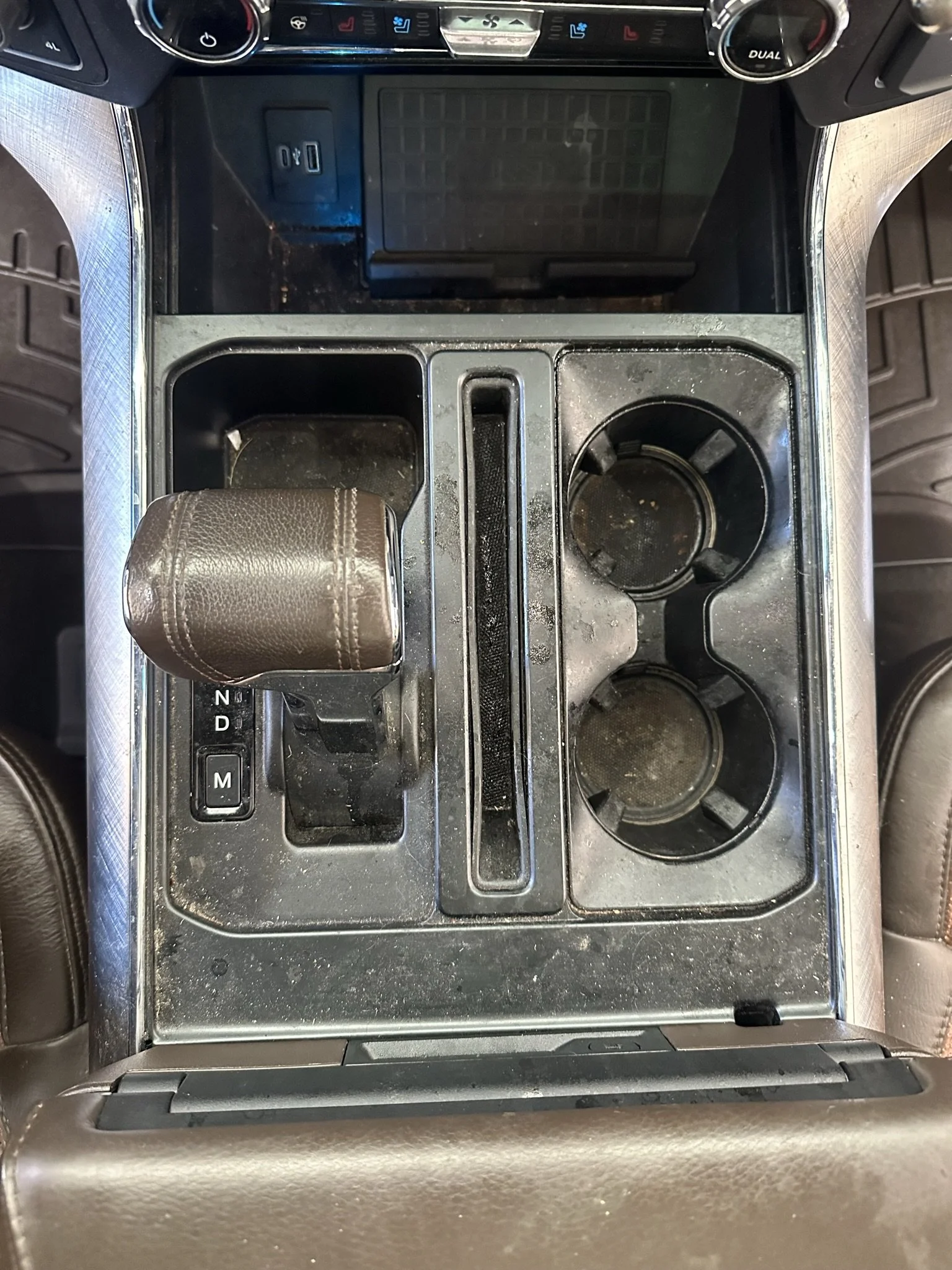 dirty cup holder in car