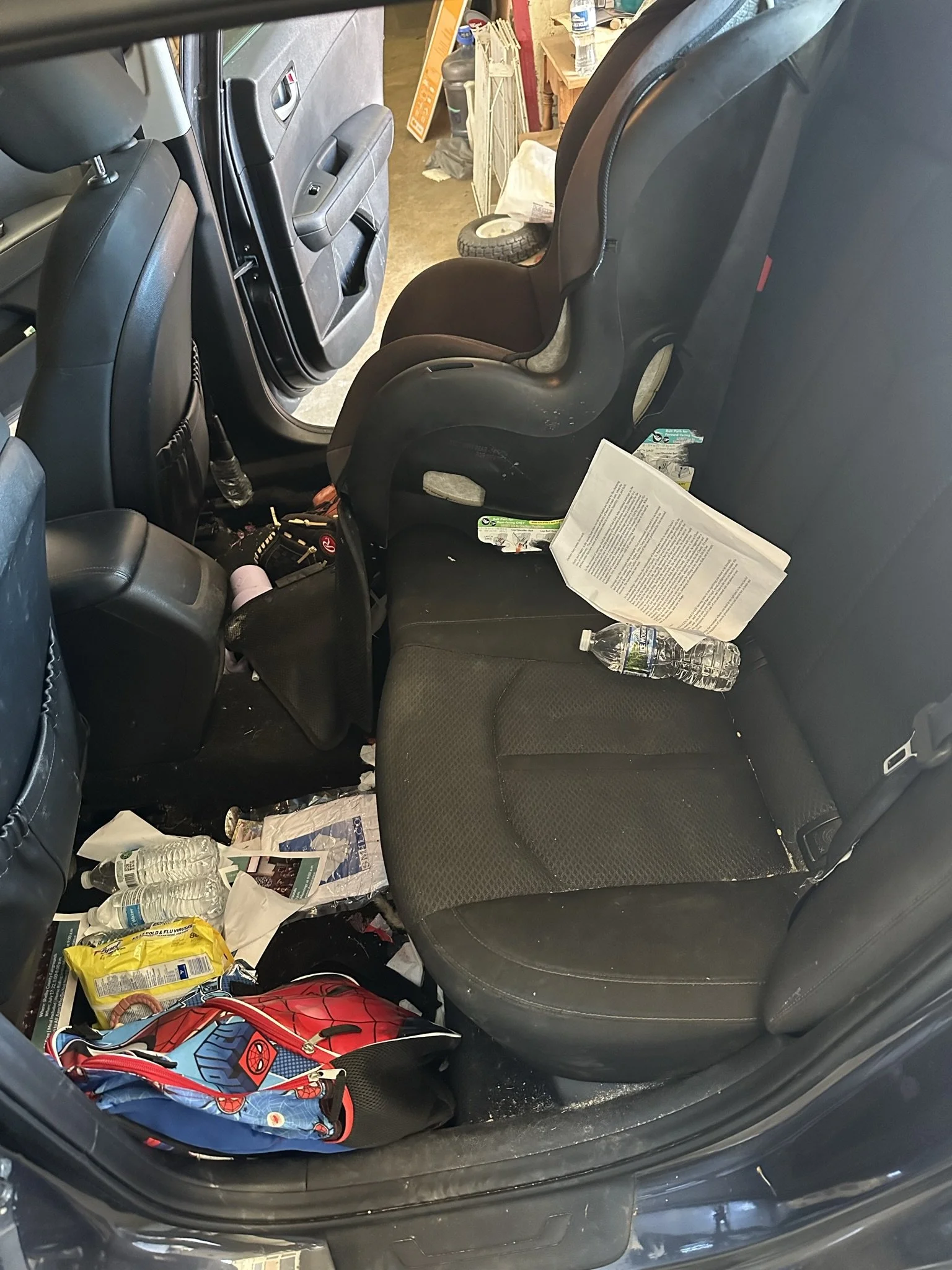 dirty back seat of car